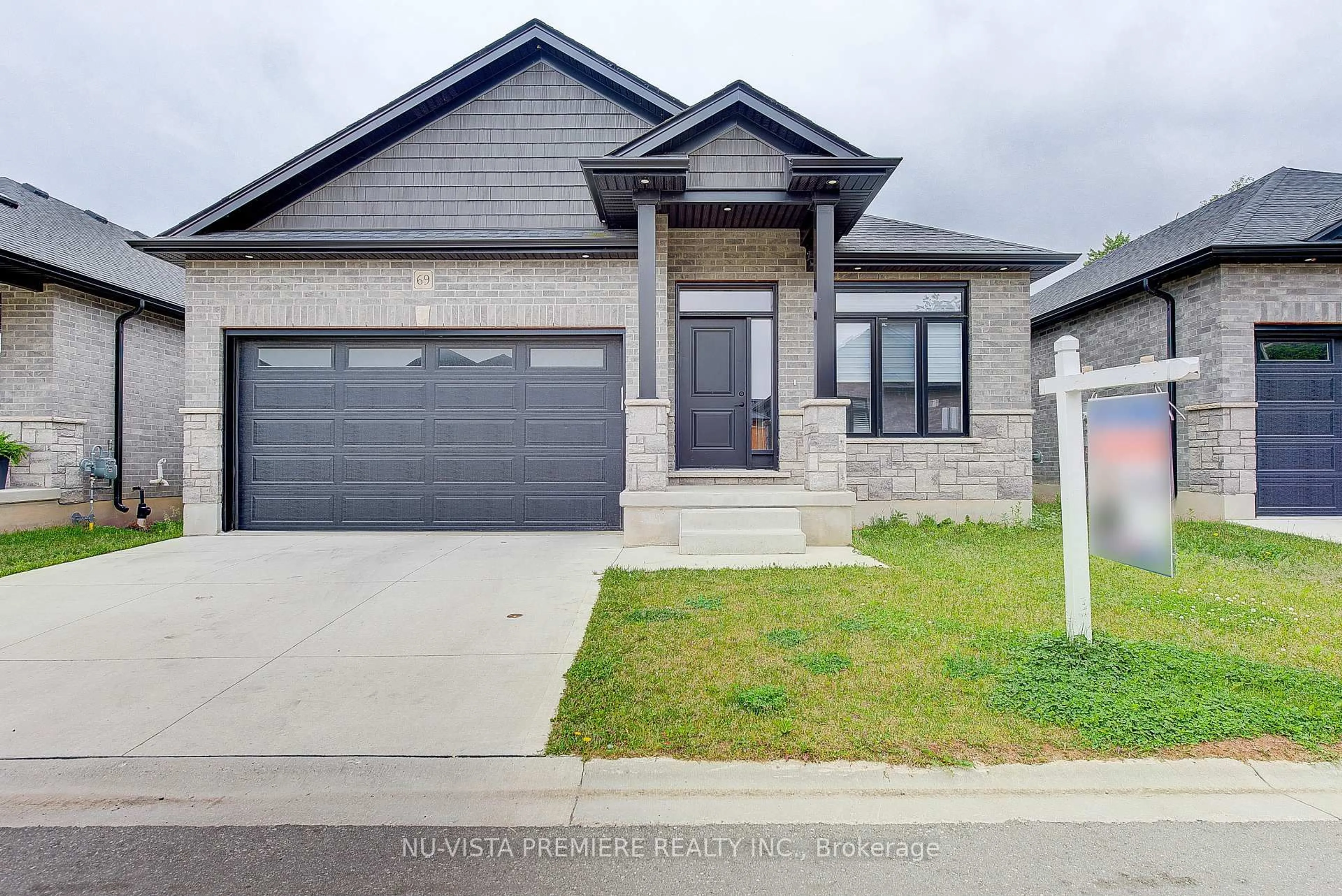 Home with brick exterior material, street for 383 Daventry Way #69, Middlesex Centre Ontario N0L 1R0