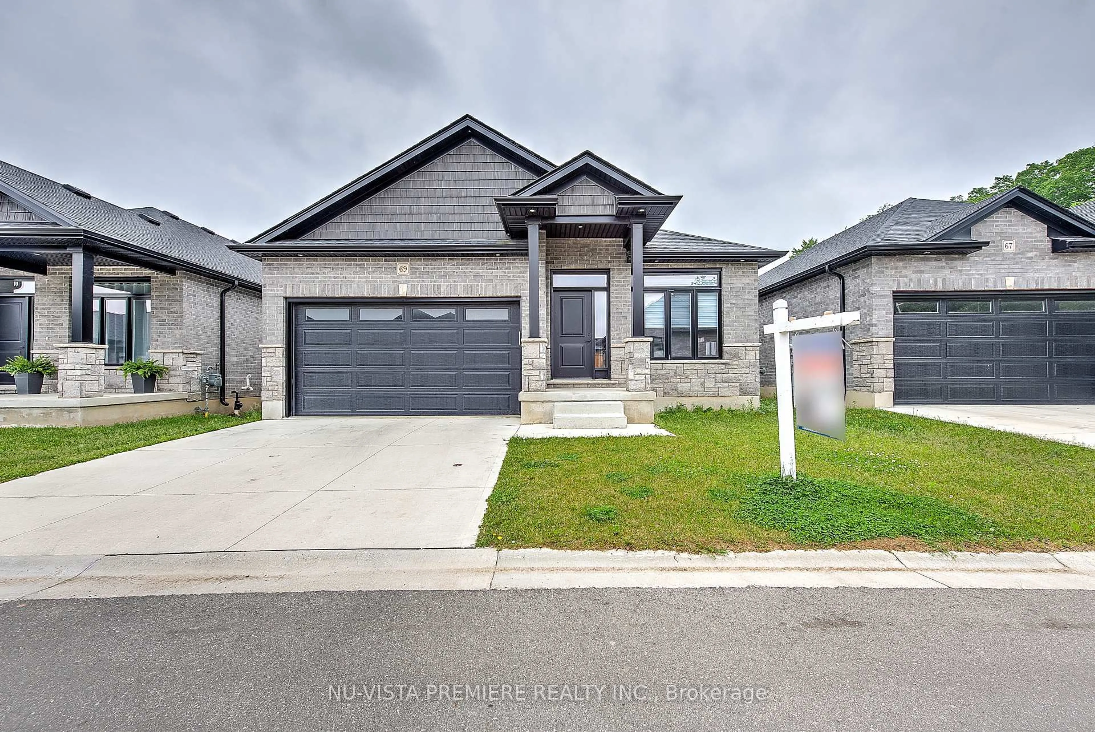 Home with brick exterior material, street for 383 Daventry Way #69, Middlesex Centre Ontario N0L 1R0