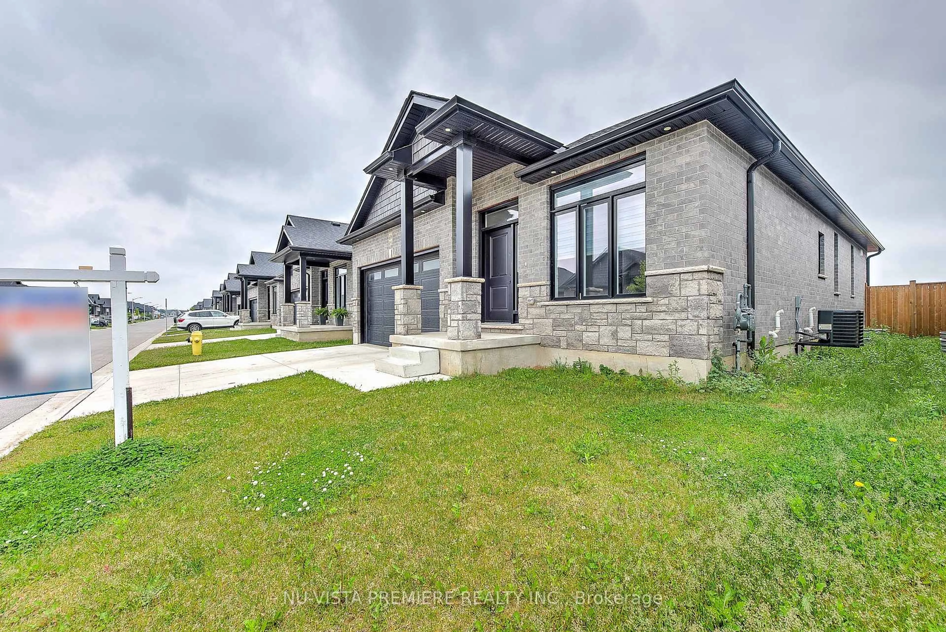 Home with brick exterior material, street for 383 Daventry Way #69, Middlesex Centre Ontario N0L 1R0