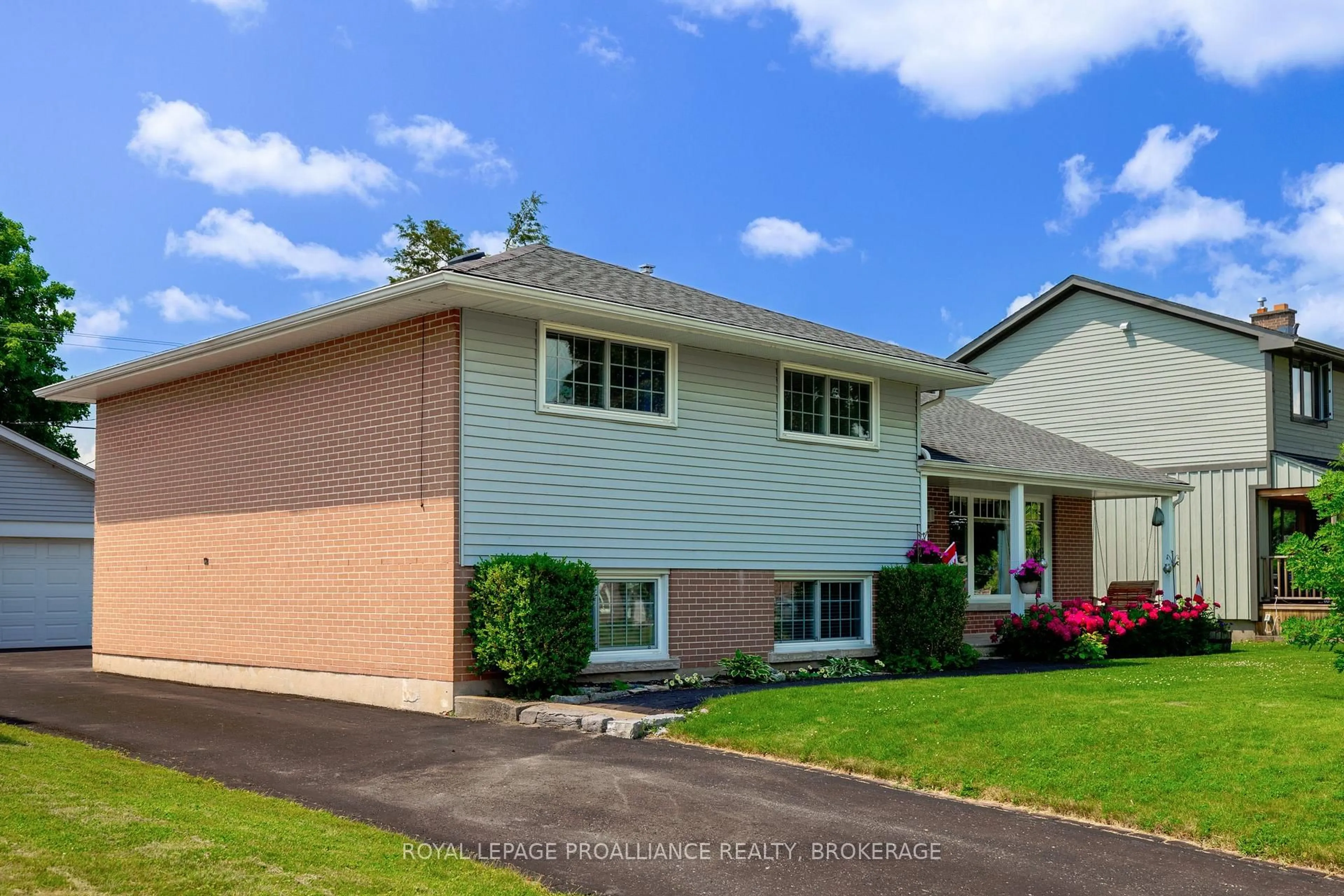 Home with vinyl exterior material, street for 323 Glen Cairn Terr, Kingston Ontario K7M 4A6