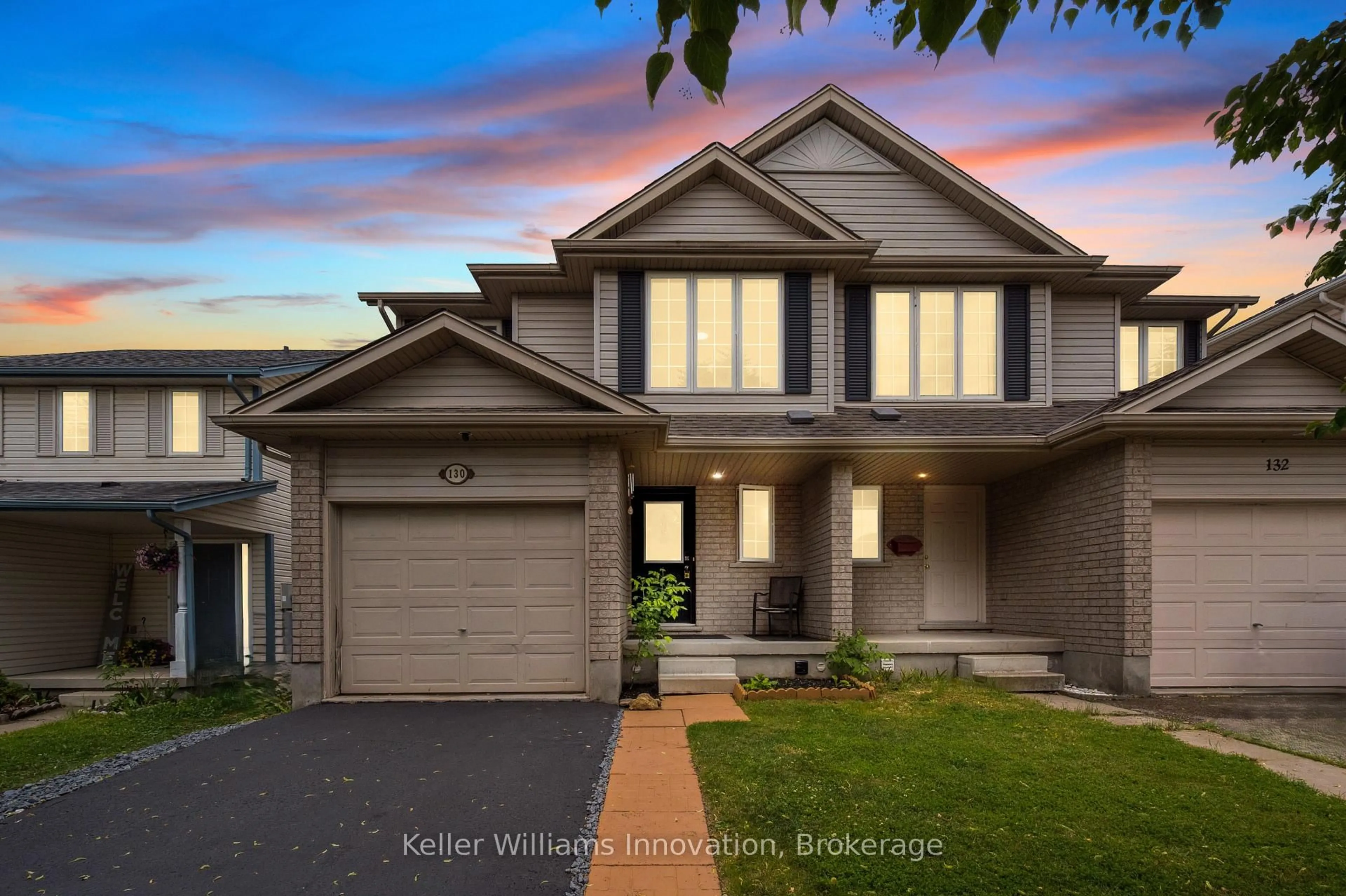 Home with vinyl exterior material, street for 130 Silurian Dr, Guelph Ontario N1E 7G1