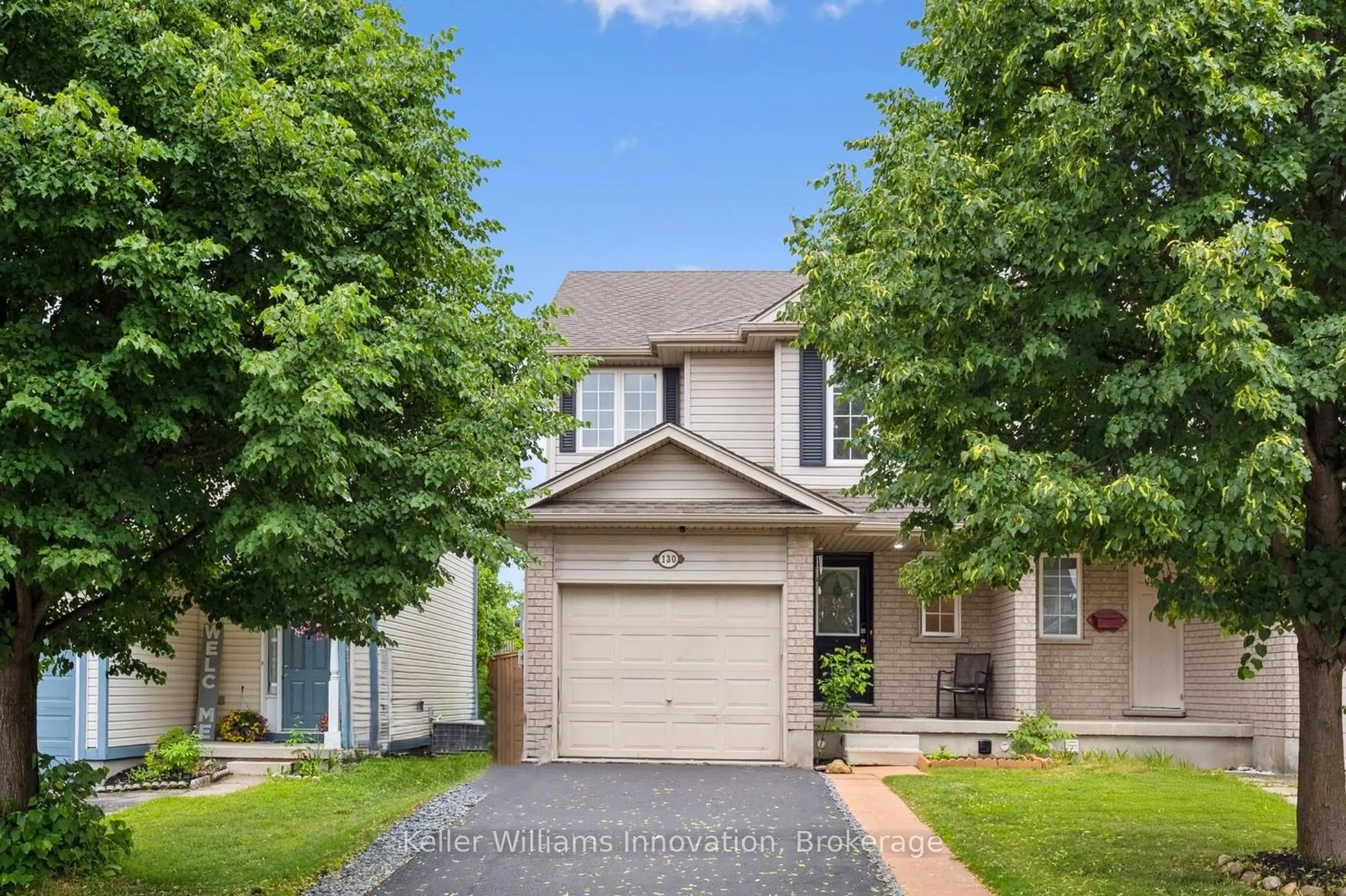 Home with brick exterior material, street for 130 Silurian Dr, Guelph Ontario N1E 7G1