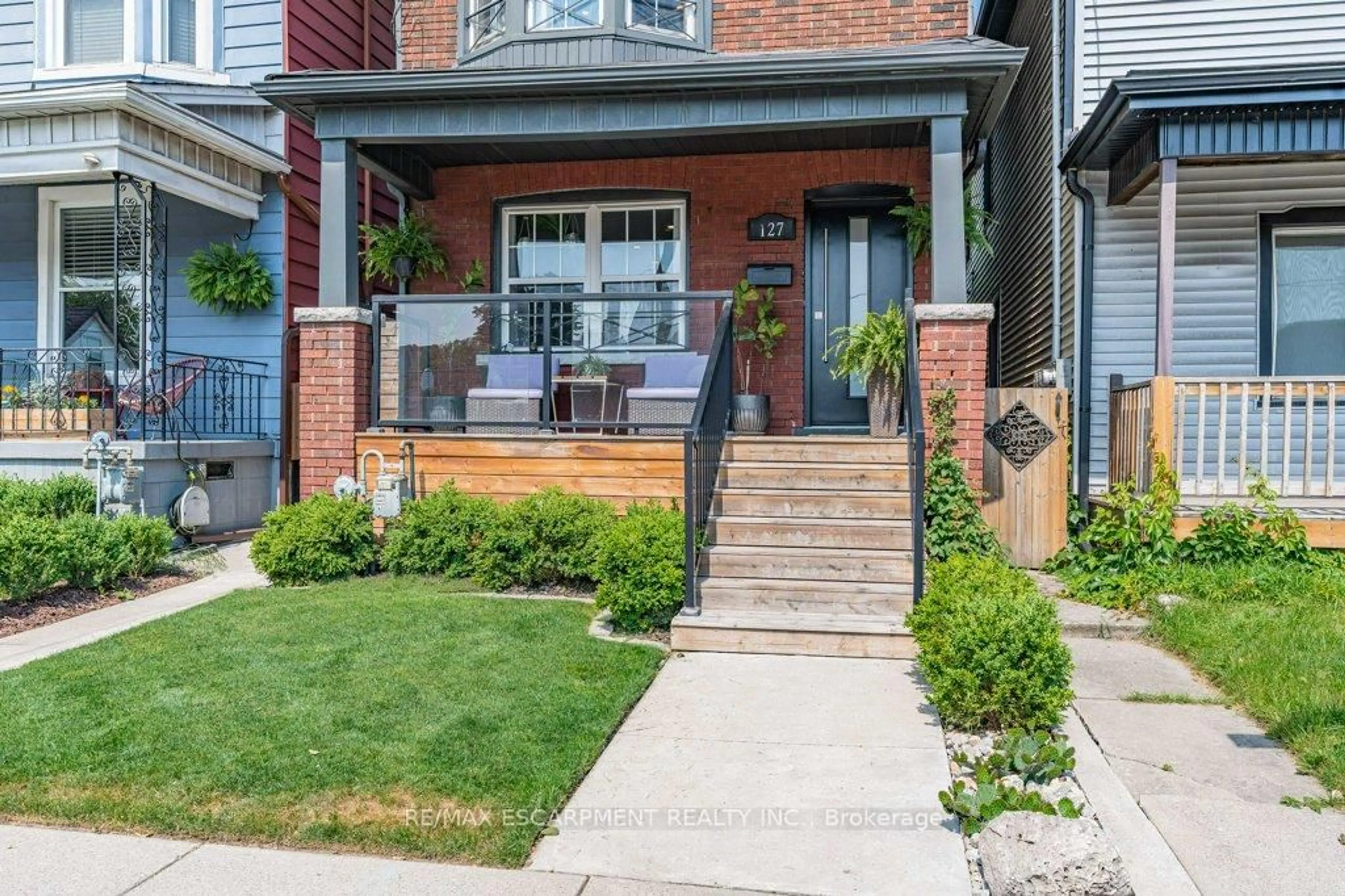 Home with brick exterior material, street for 127 Sherman Ave, Hamilton Ontario L8L 6M3
