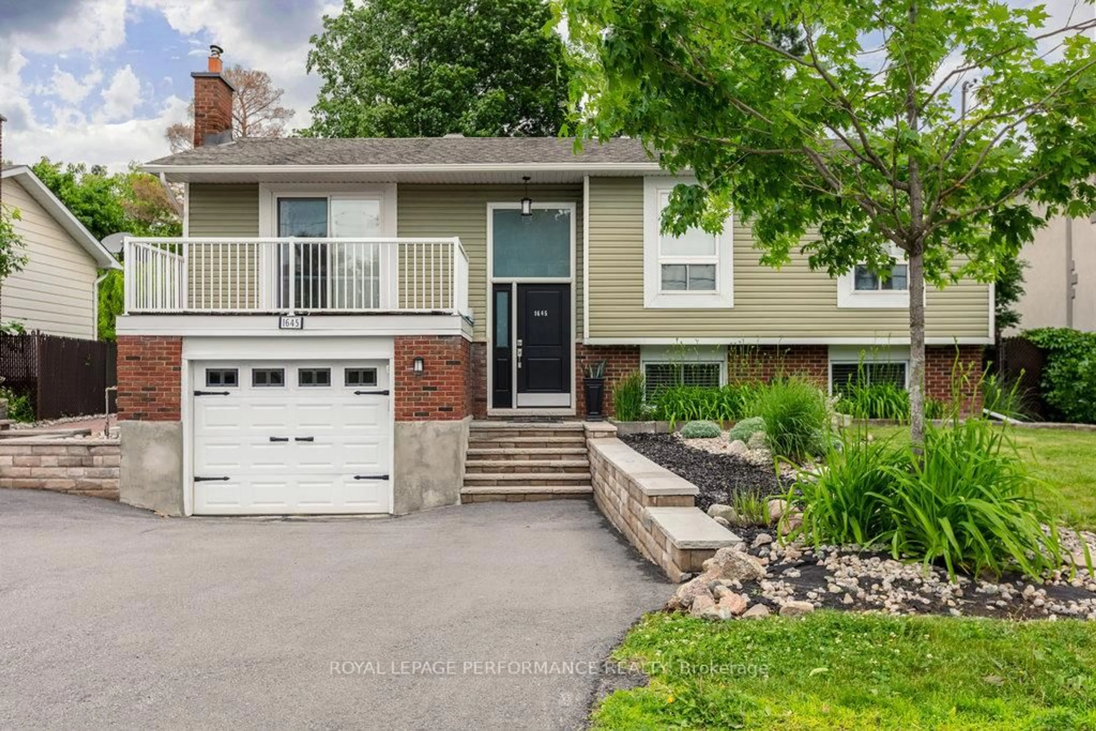 Home with vinyl exterior material, street for 1645 Fisher Ave, Ottawa Ontario K2C 1X8