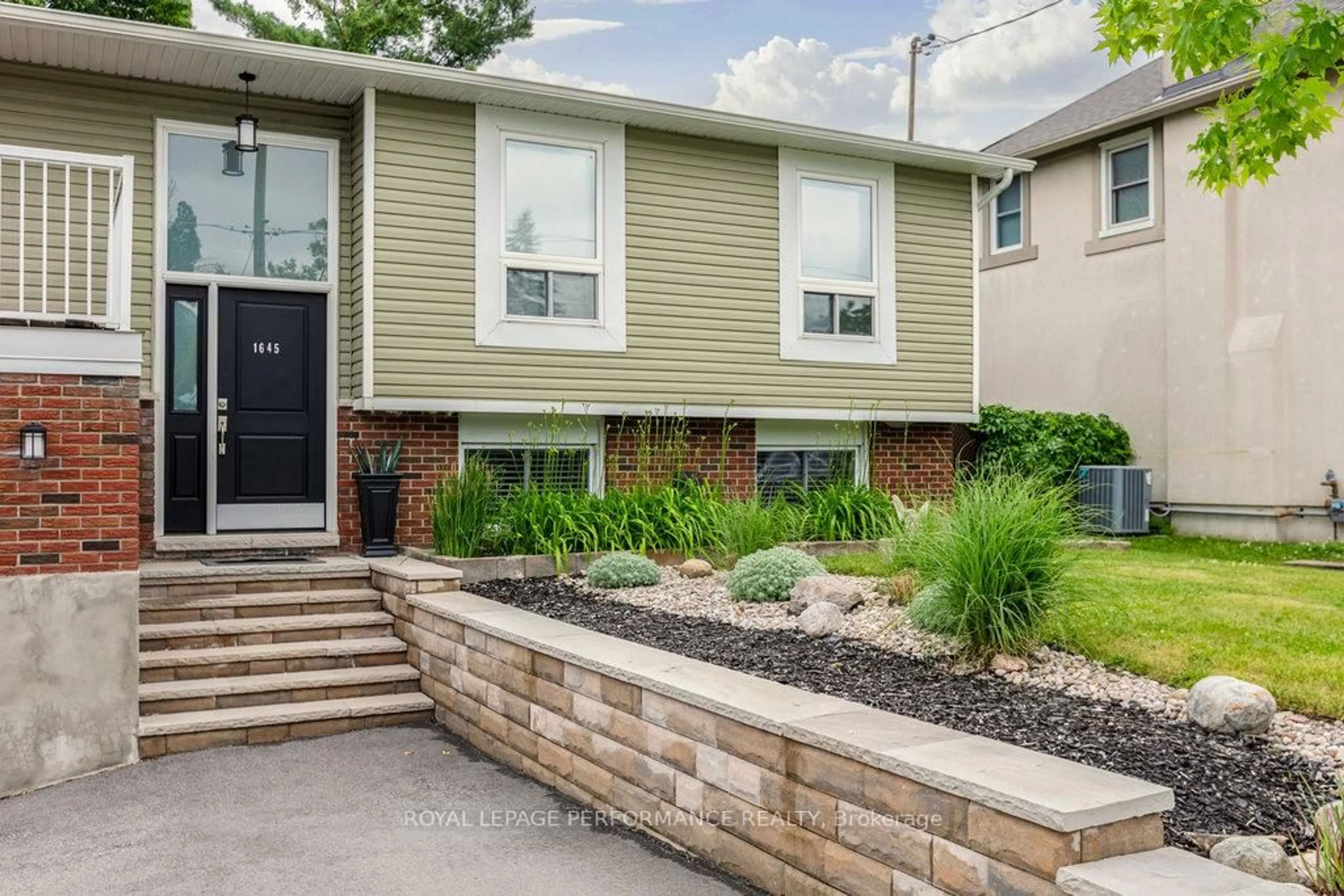 Home with brick exterior material, street for 1645 Fisher Ave, Ottawa Ontario K2C 1X8