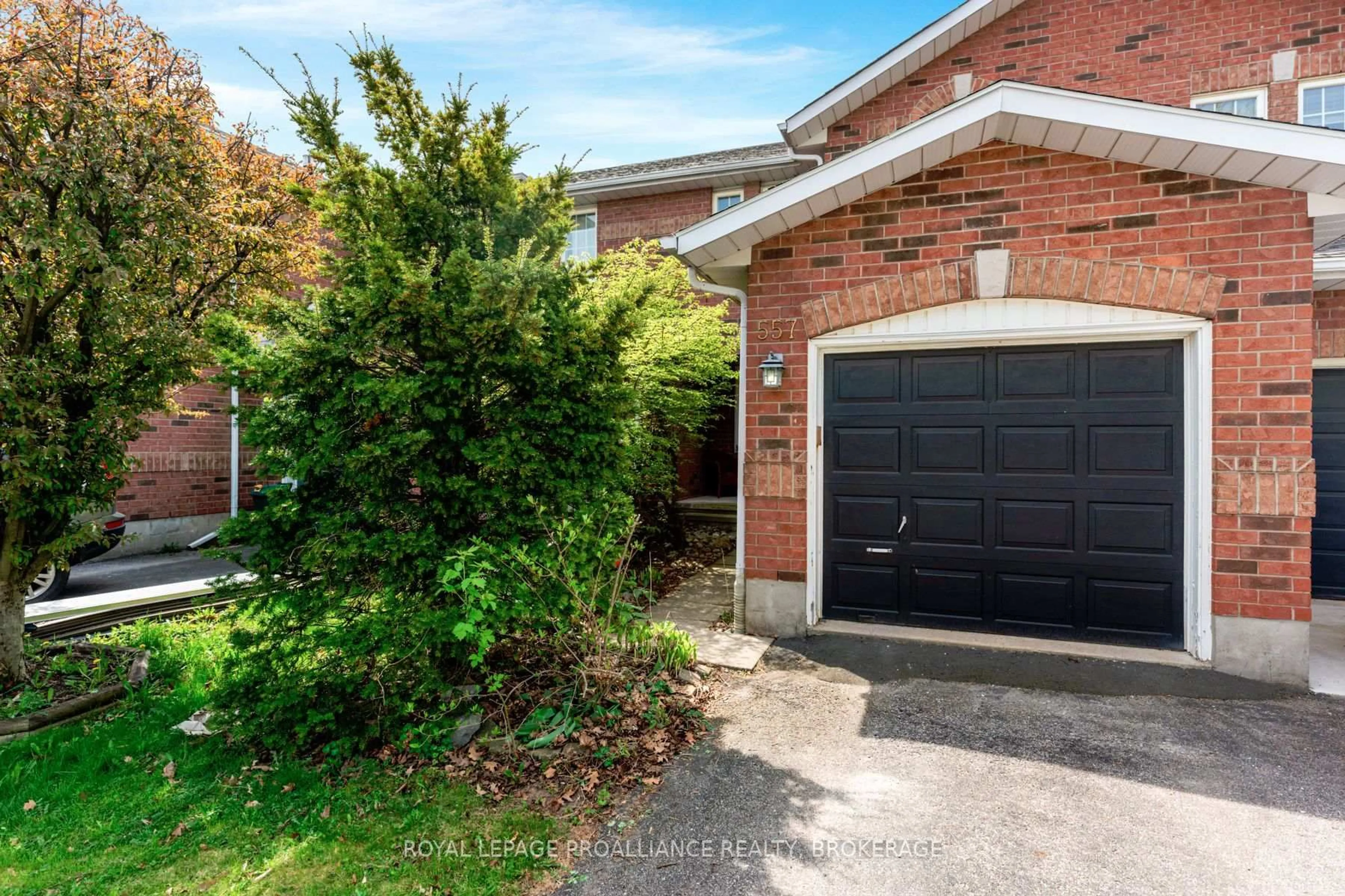 Home with brick exterior material, street for 557 Quail Crt, Kingston Ontario K7M 8Z4