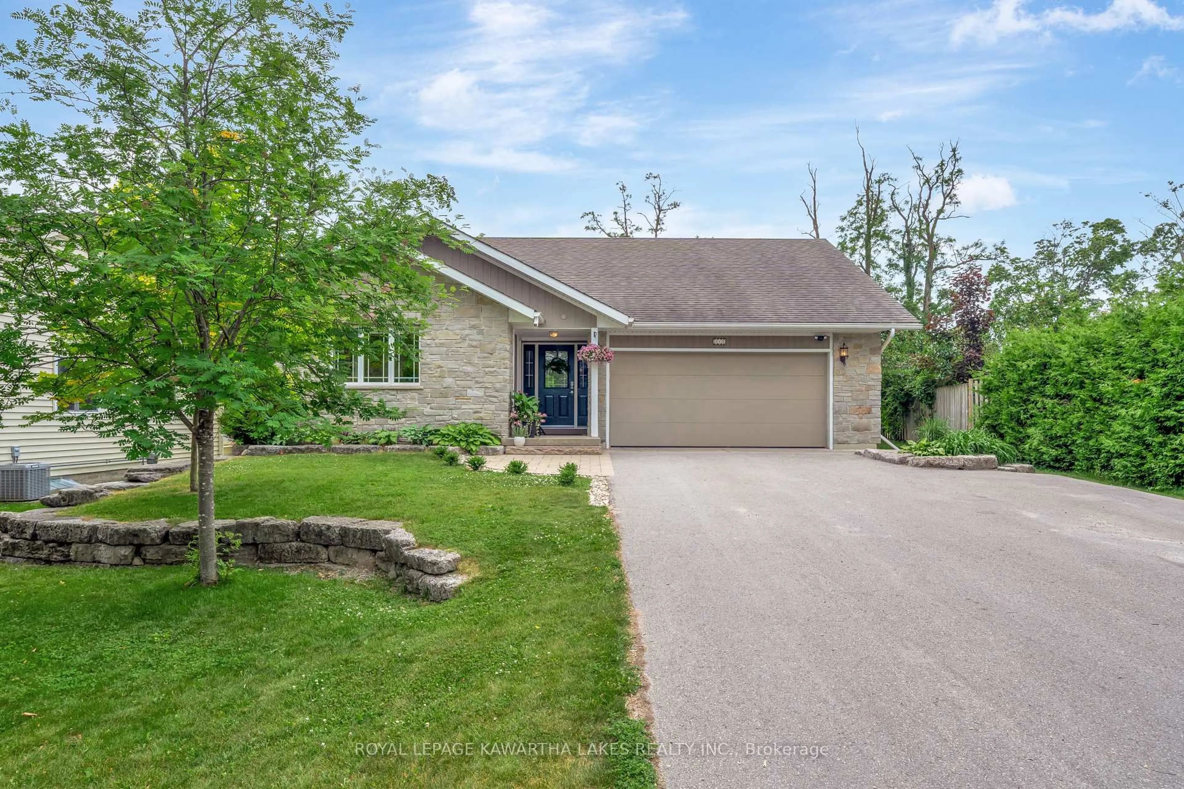 Home with brick exterior material, street for 113 Queen St, Kawartha Lakes Ontario K0M 1N0