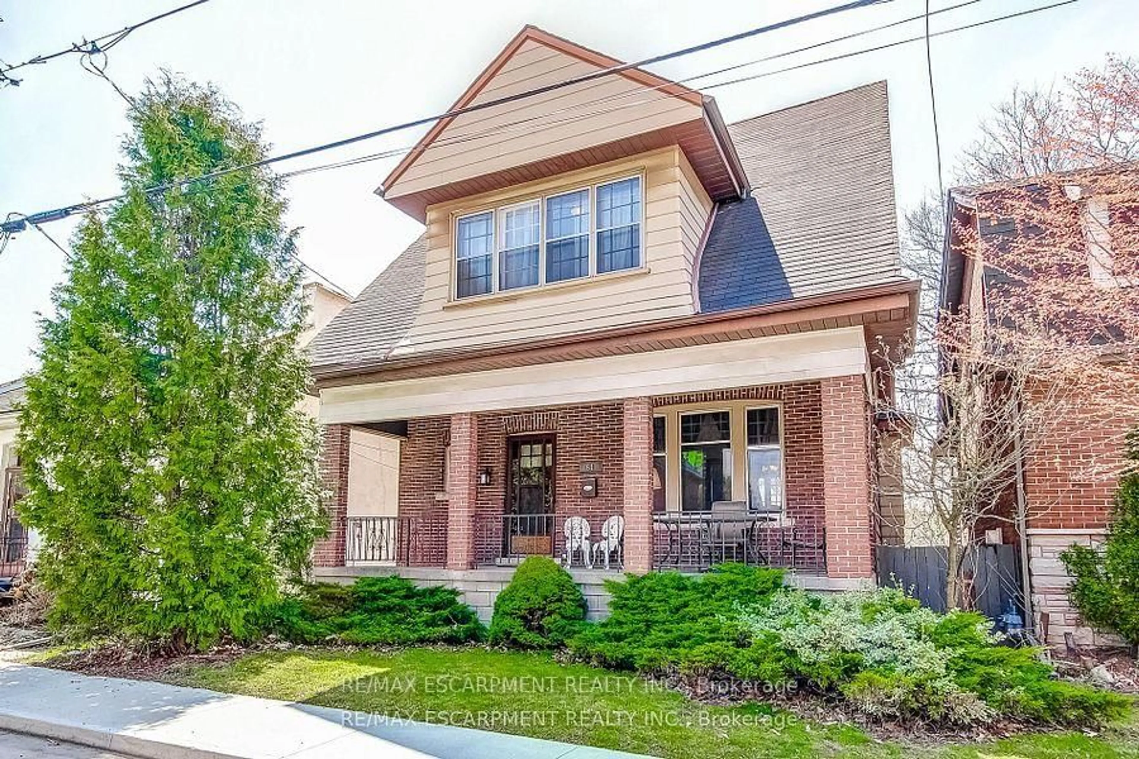 Home with brick exterior material, street for 51 Canada St, Hamilton Ontario L8P 1P1