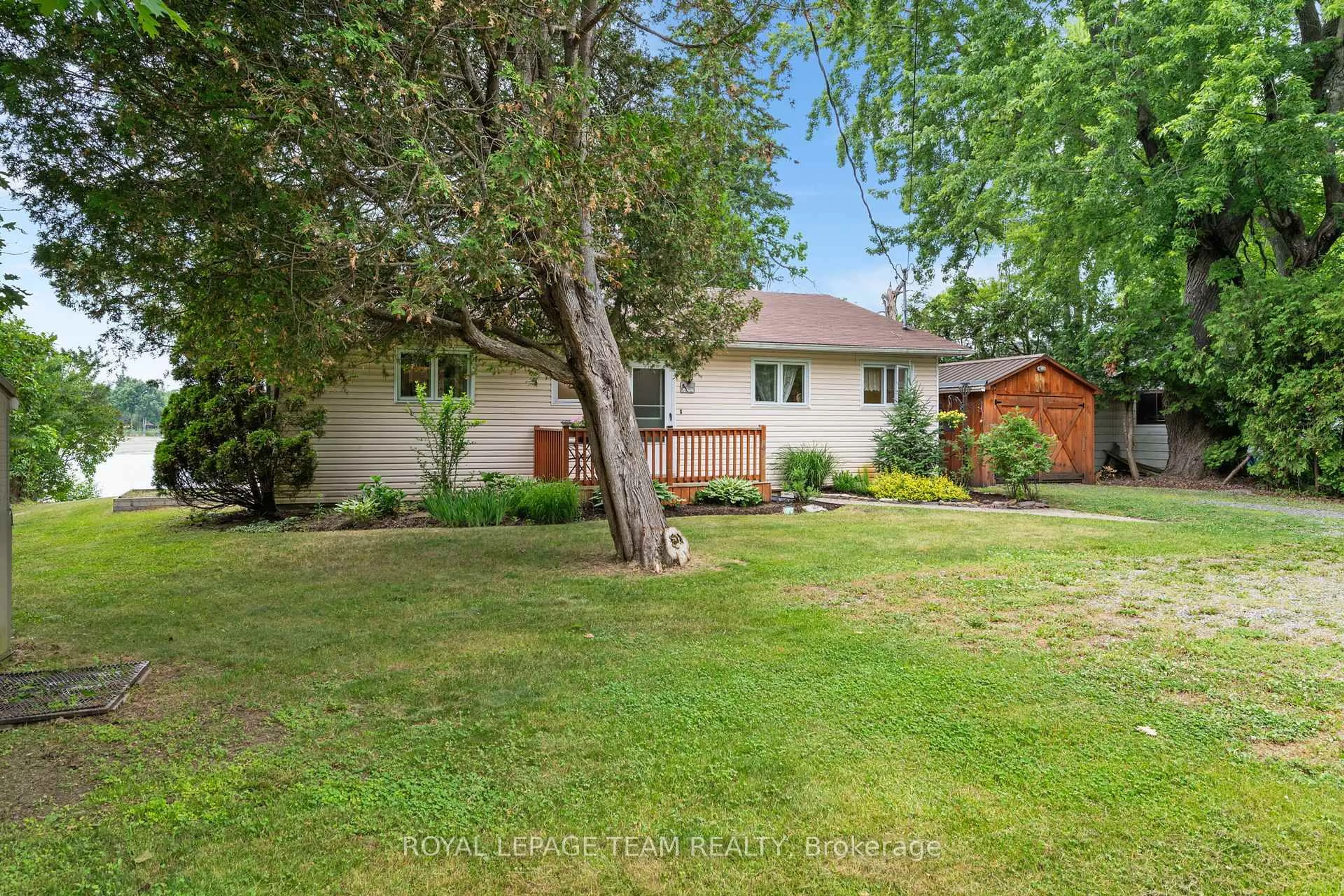 A pic from outside/outdoor area/front of a property/back of a property/a pic from drone, water/lake/river/ocean view for 2733 Rideau Glen Lane, North Grenville Ontario K0G 1J0