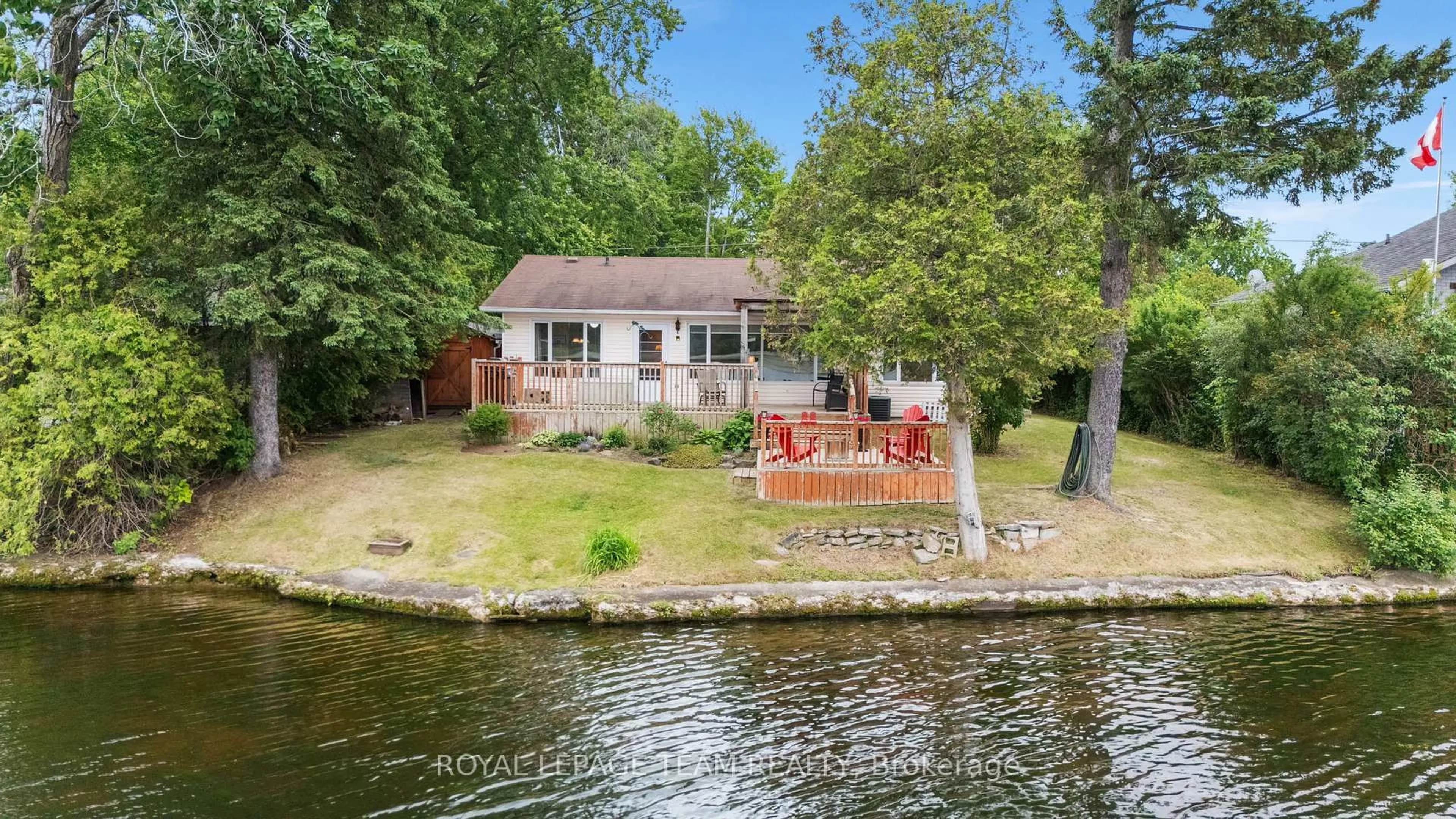 A pic from outside/outdoor area/front of a property/back of a property/a pic from drone, water/lake/river/ocean view for 2733 Rideau Glen Lane, North Grenville Ontario K0G 1J0