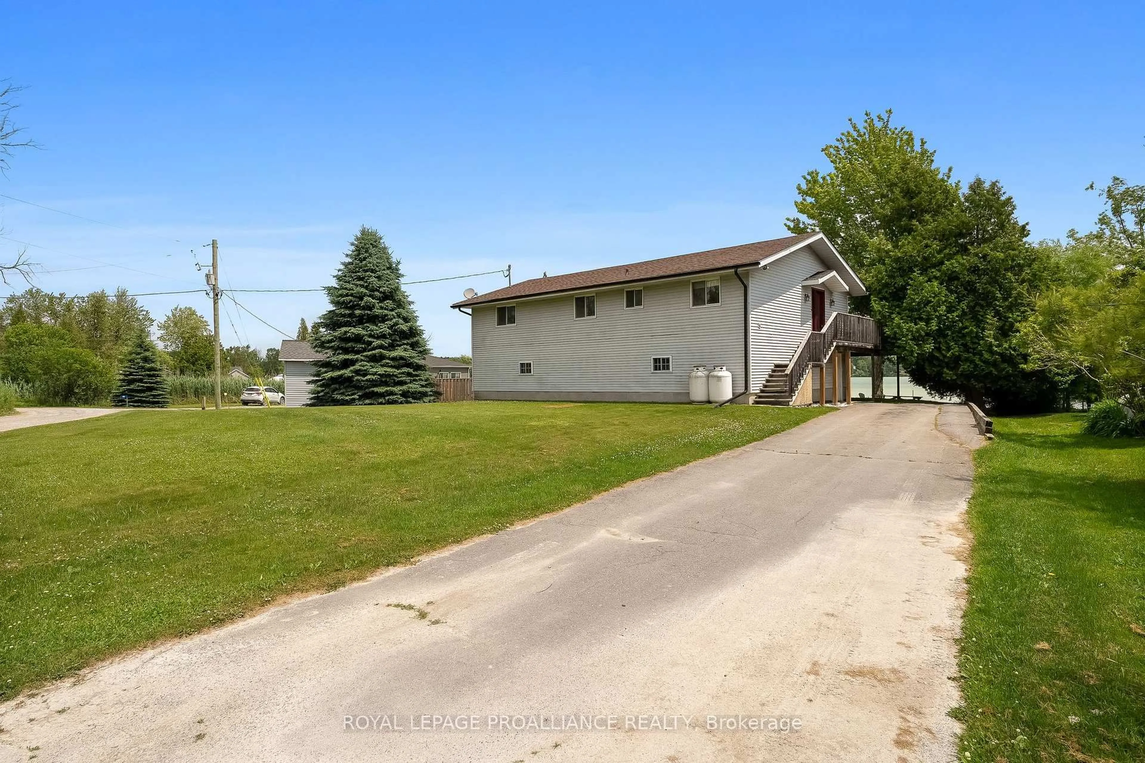 A pic from outside/outdoor area/front of a property/back of a property/a pic from drone, street for 61 McDonald Rd, Cramahe Ontario K0K 1S0