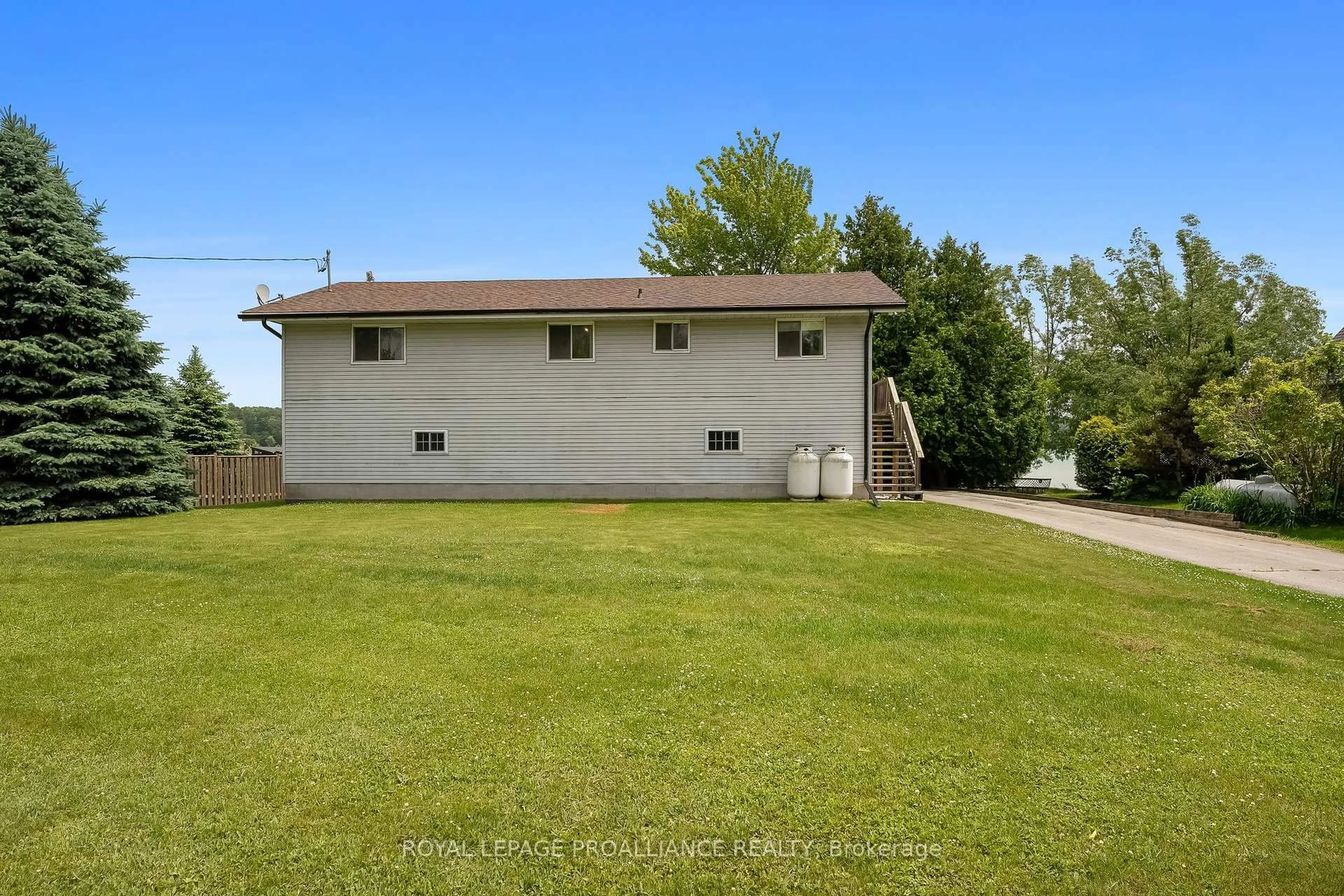 A pic from outside/outdoor area/front of a property/back of a property/a pic from drone, water/lake/river/ocean view for 61 McDonald Rd, Cramahe Ontario K0K 1S0