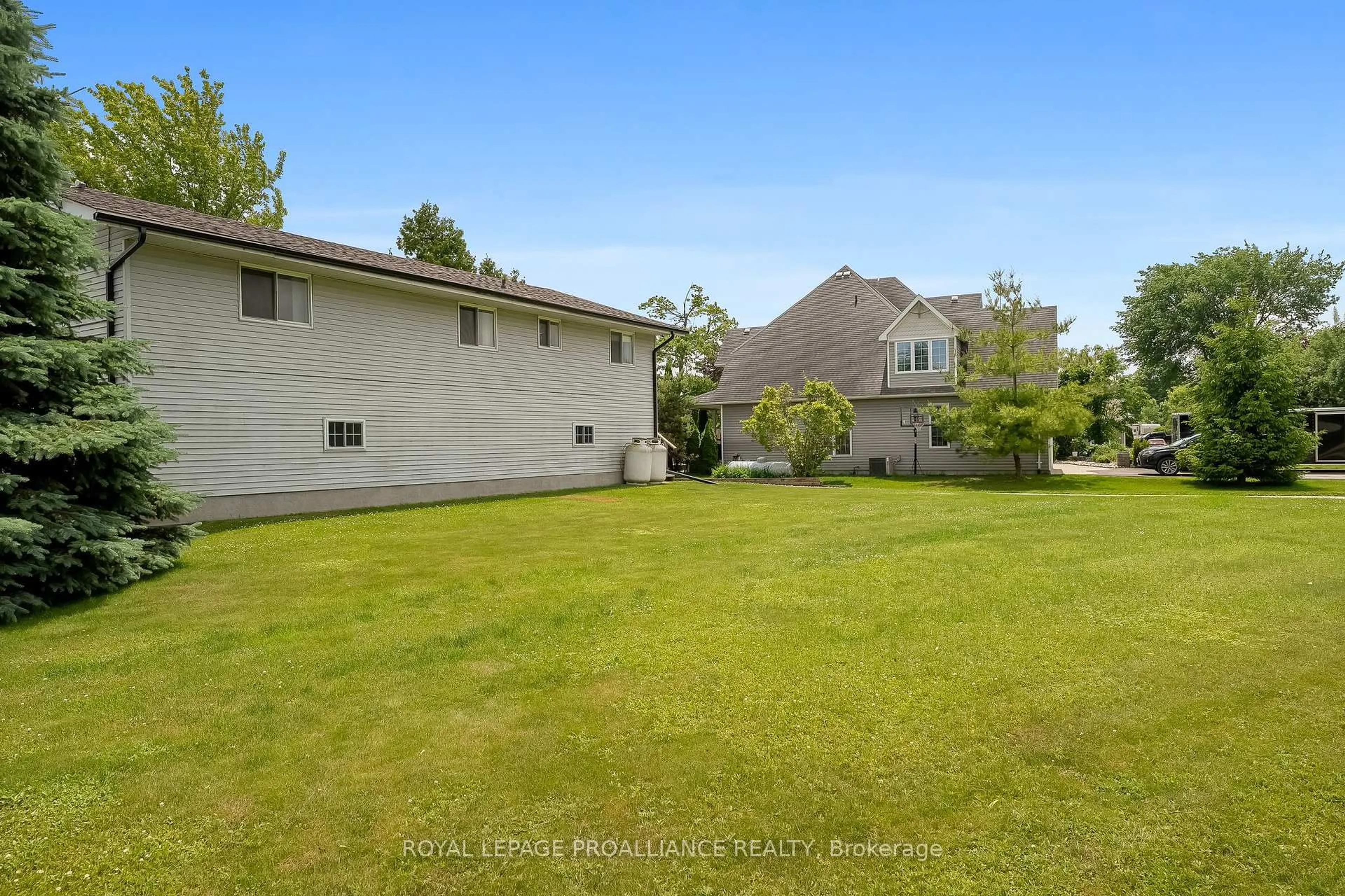 A pic from outside/outdoor area/front of a property/back of a property/a pic from drone, water/lake/river/ocean view for 61 McDonald Rd, Cramahe Ontario K0K 1S0