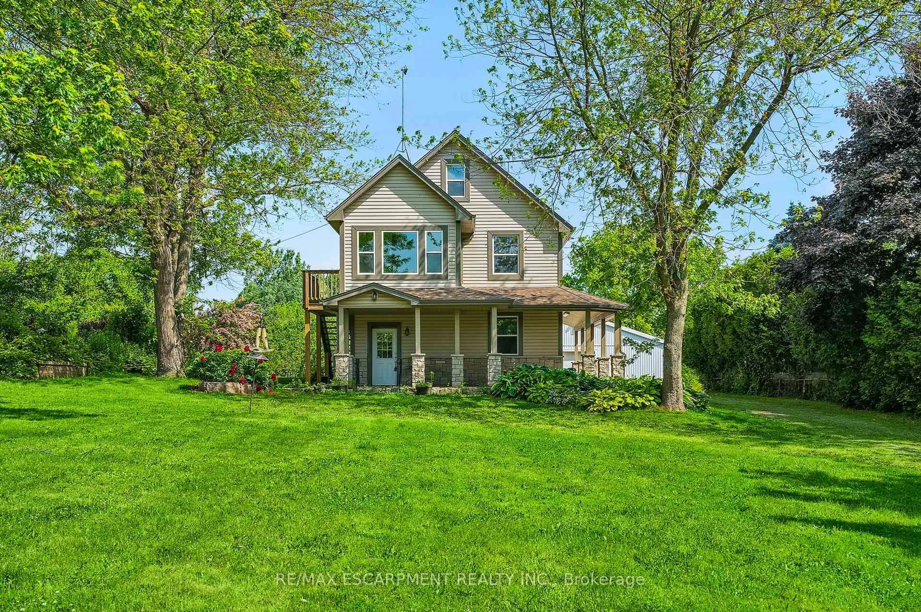 A pic from outside/outdoor area/front of a property/back of a property/a pic from drone, street for 483 Harvest Rd, Hamilton Ontario L9H 5E2