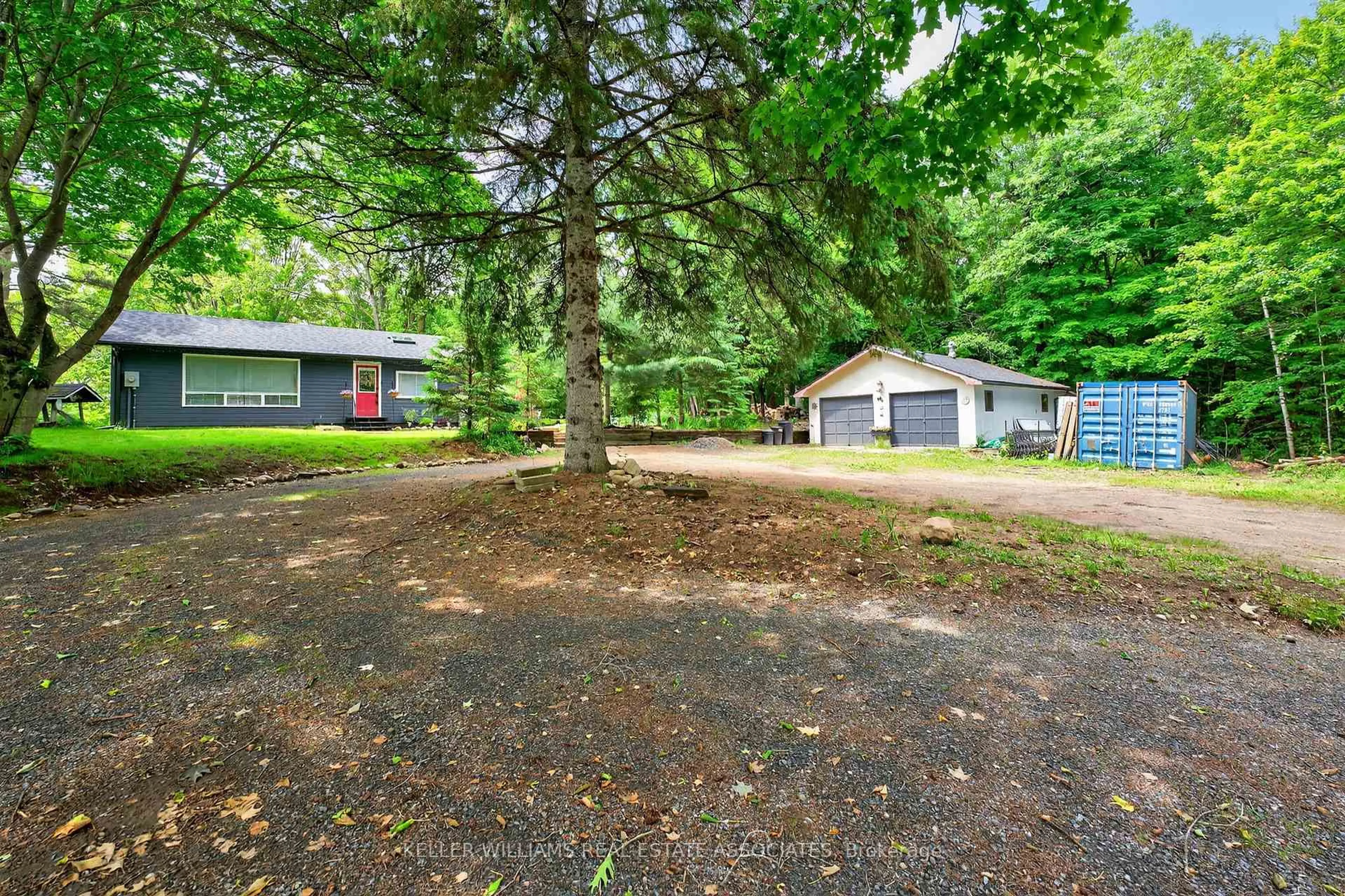 A pic from outside/outdoor area/front of a property/back of a property/a pic from drone, forest/trees view for 17377 35 Highway, Algonquin Highlands Ontario K0M 1J2