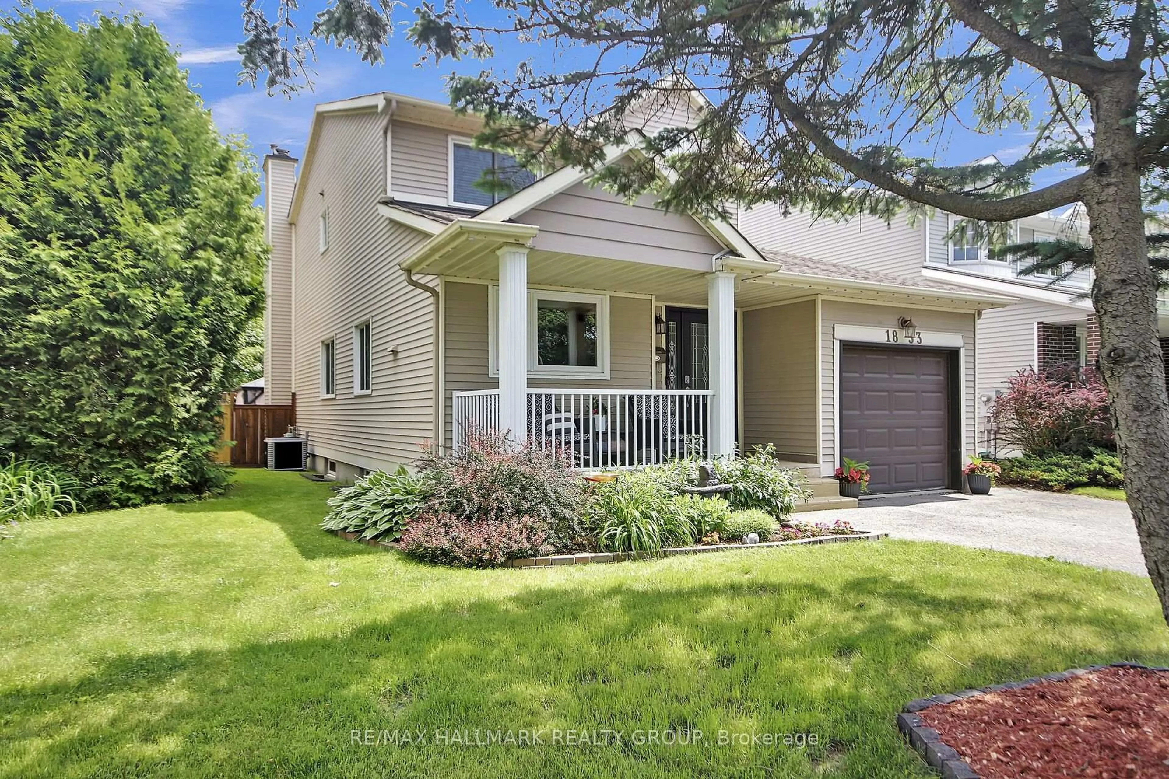 Home with vinyl exterior material, street for 1833 Windflower Way, Orleans Ontario K1C 5Z8