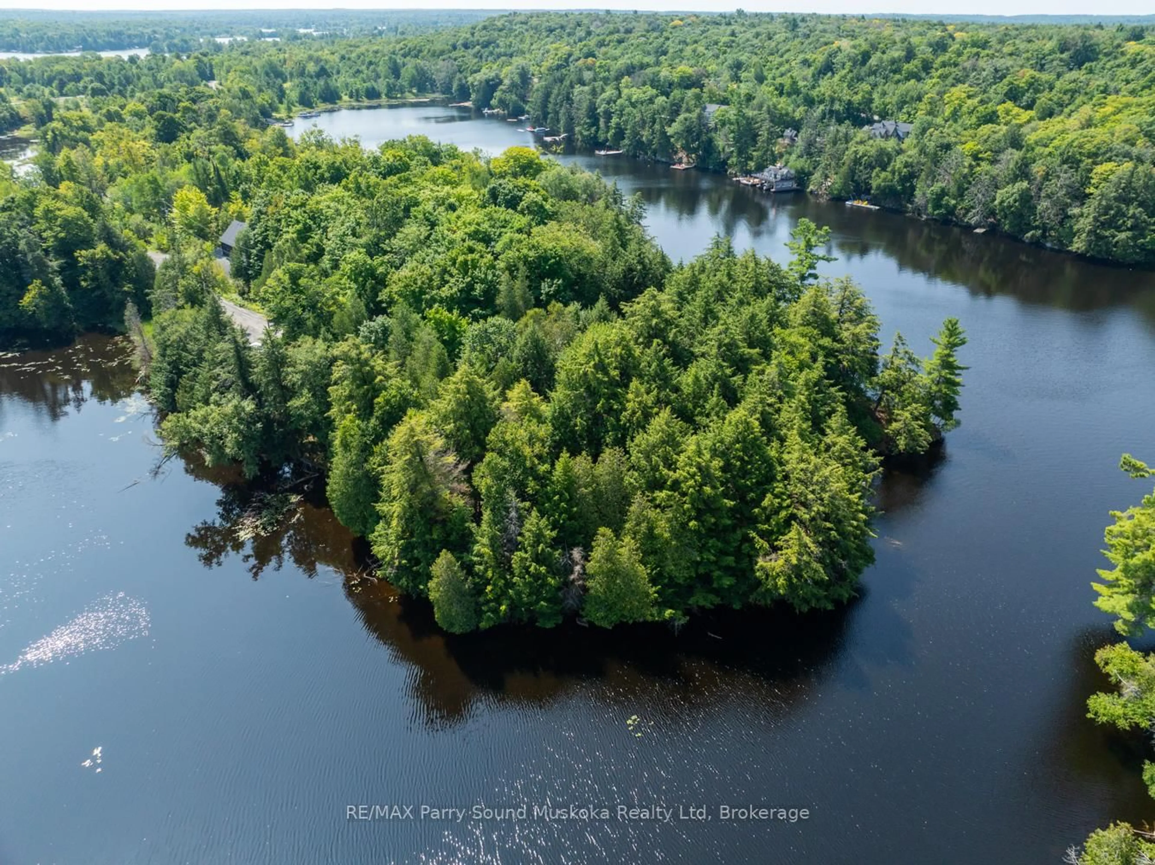 A pic from outside/outdoor area/front of a property/back of a property/a pic from drone, water/lake/river/ocean view for 18 MEHARG Dr, McKellar Ontario P2A 0B5