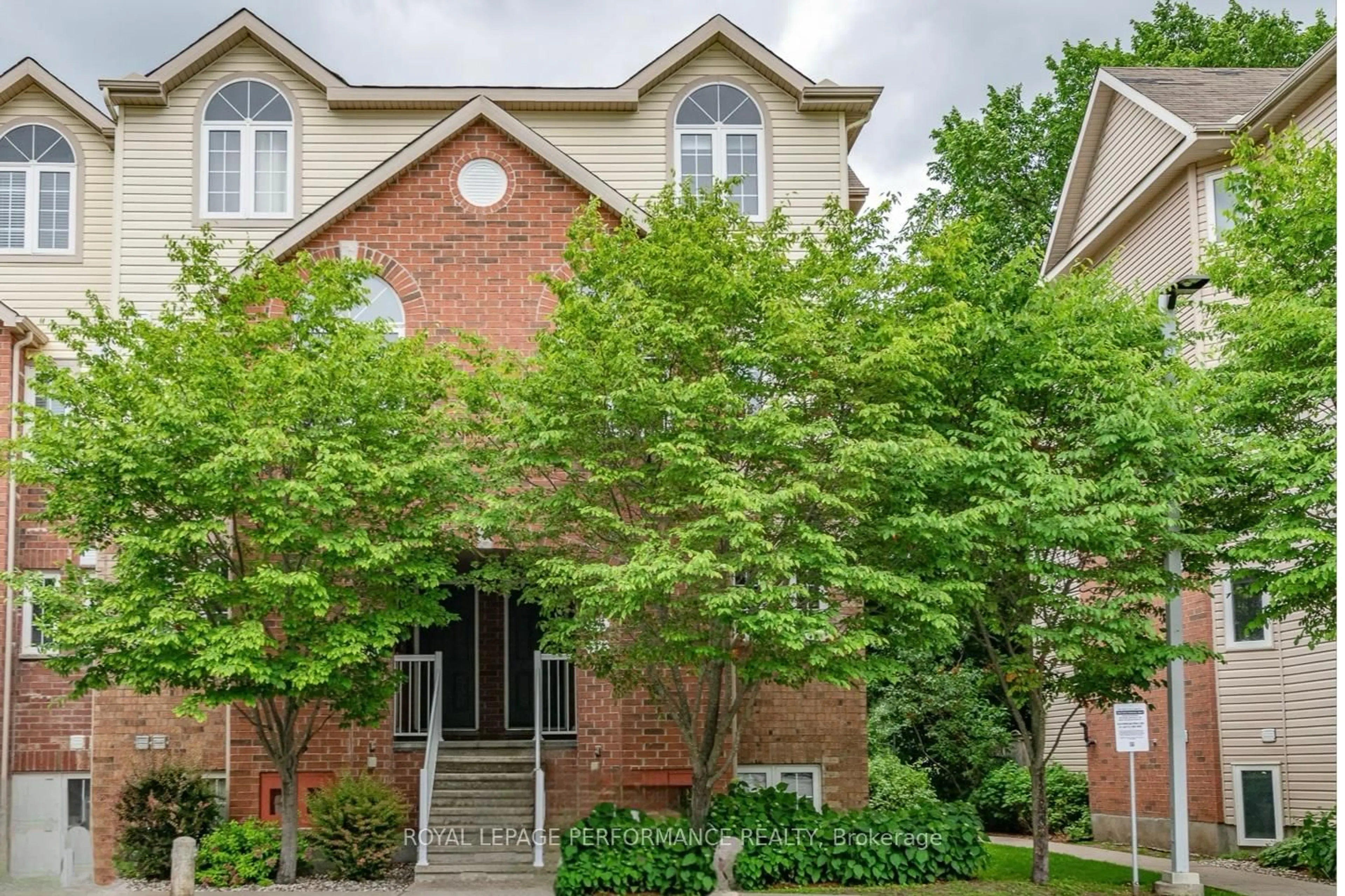 Home with brick exterior material, street for 111 Steele Park Private #14, Ottawa Ontario K1J 0J2