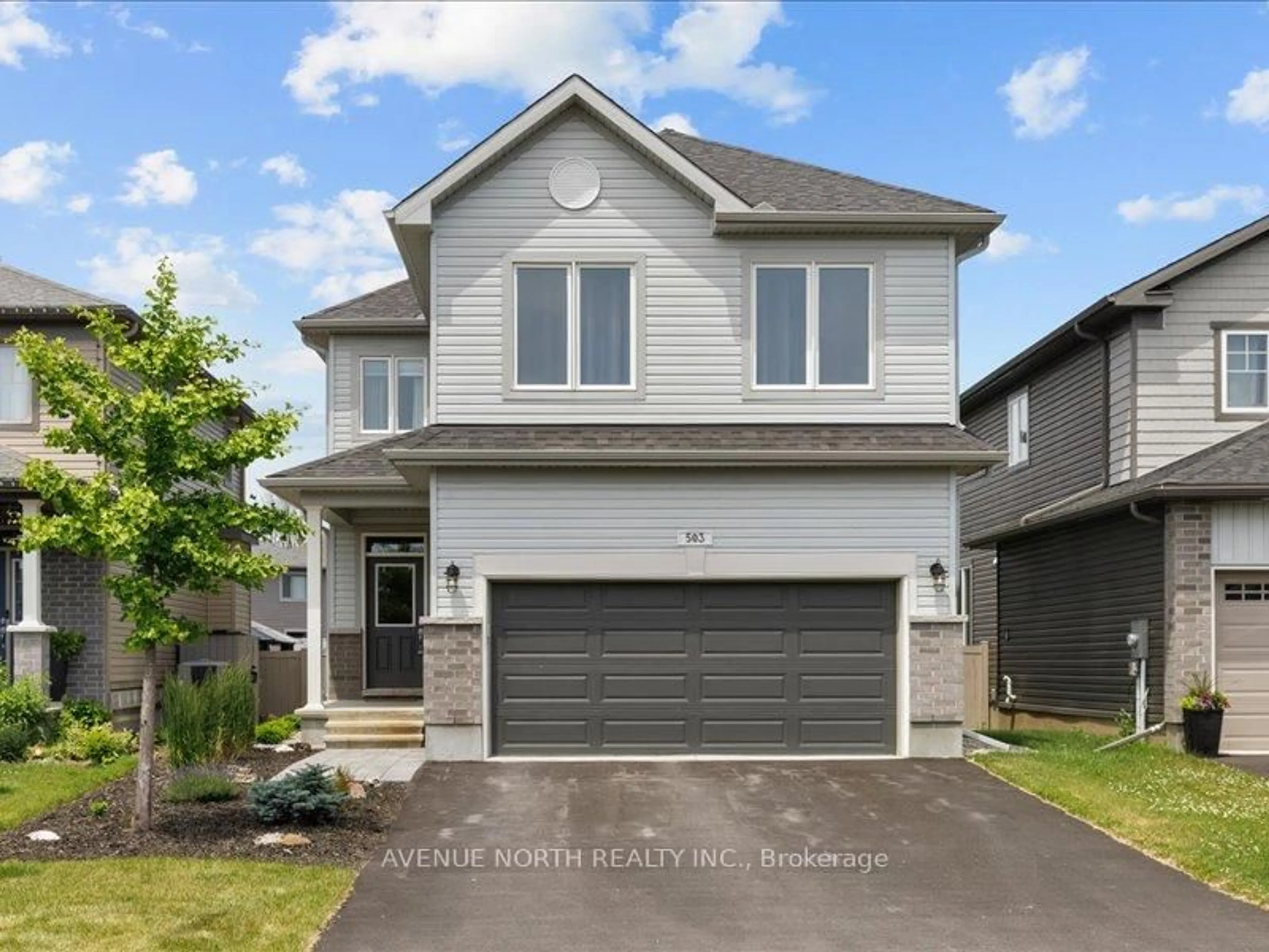 Home with vinyl exterior material, street for 503 Kindred Cres, North Grenville Ontario K0G 1J0