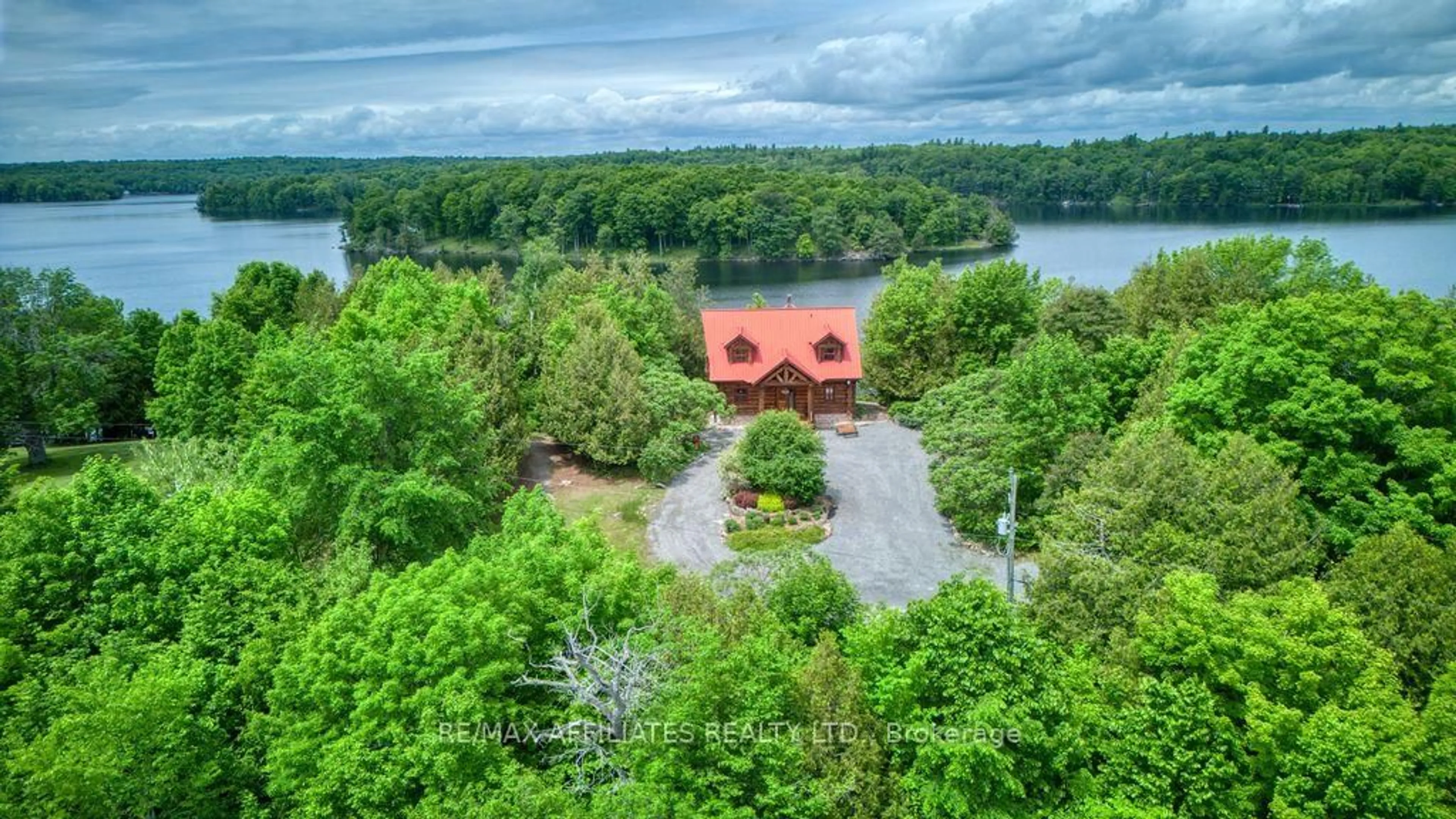 A pic from outside/outdoor area/front of a property/back of a property/a pic from drone, water/lake/river/ocean view for 1602 Crozier D Rd, Westport Ontario K0G 1X0