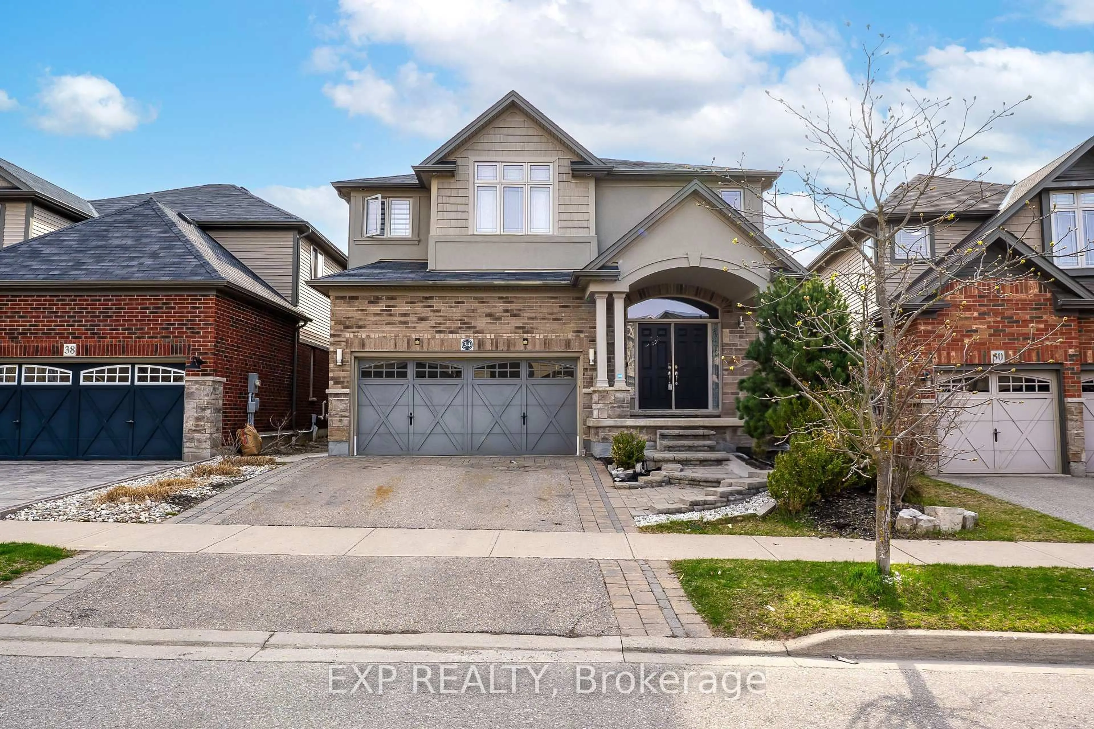 Home with brick exterior material, street for 34 Adencliffe St, Kitchener Ontario N2R 0B5
