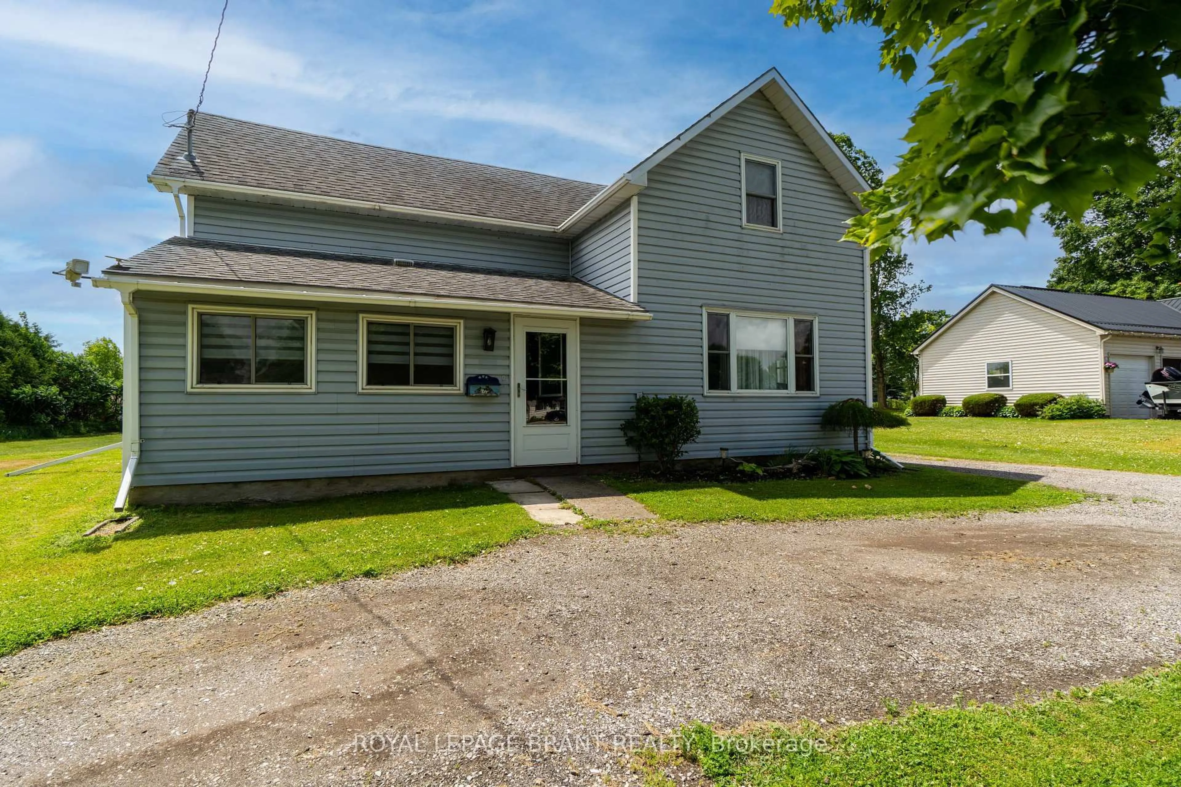 A pic from outside/outdoor area/front of a property/back of a property/a pic from drone, street for 1494 Norfolk County Rd 19 Rd, Norfolk Ontario N0E 1V0