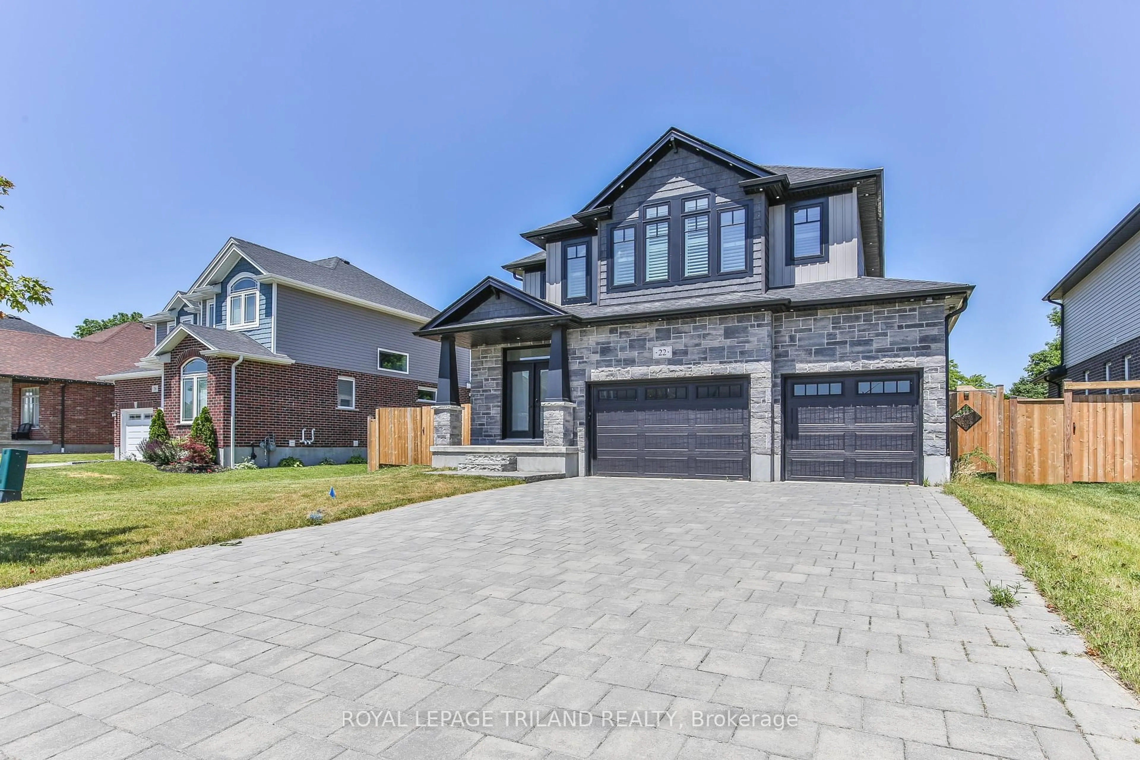 Home with brick exterior material, street for 22 Darlison Dr, Zorra Ontario N0M 2M0