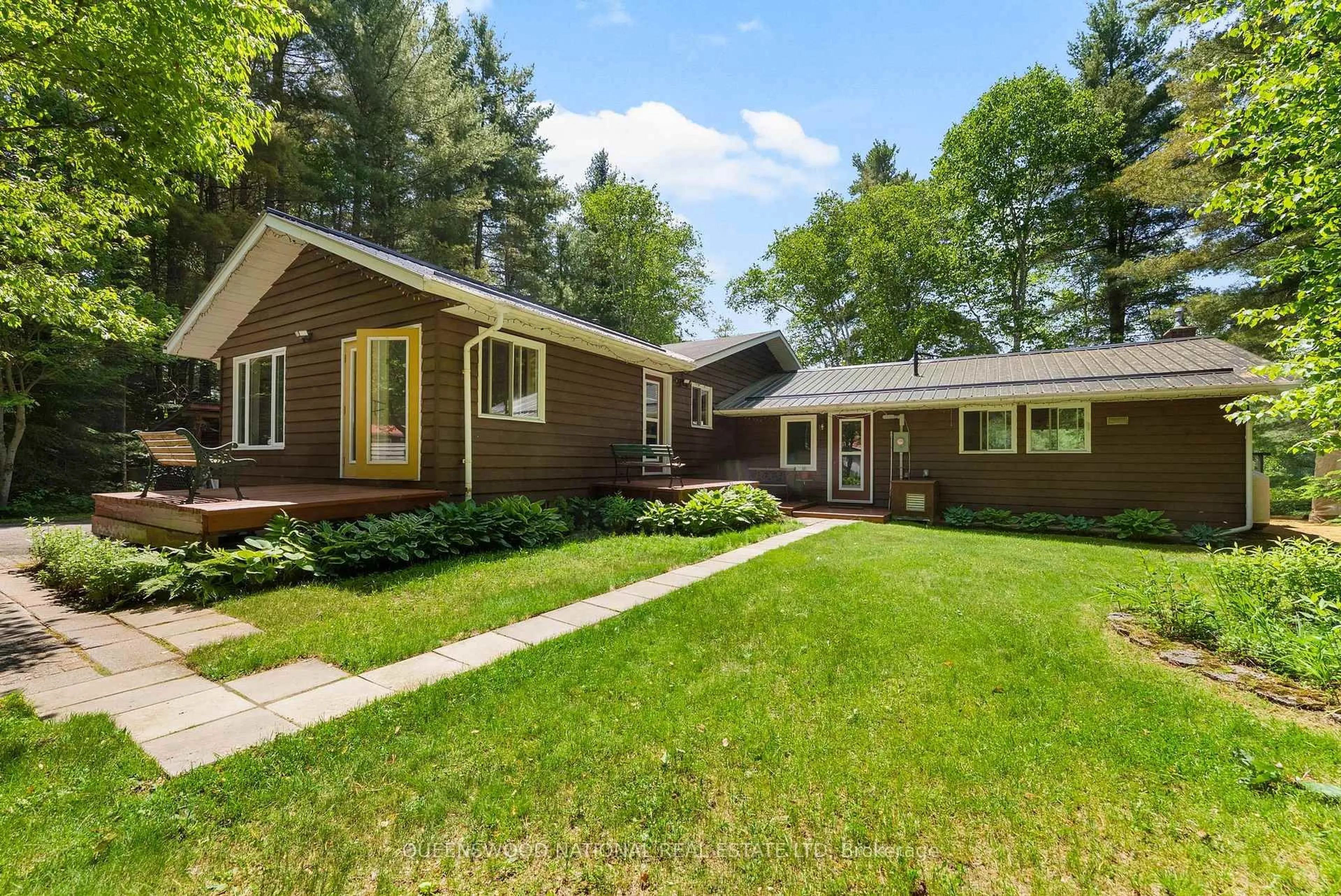 Home with vinyl exterior material, street for 618 River Rd, Barry's Bay Ontario K0J 1B0