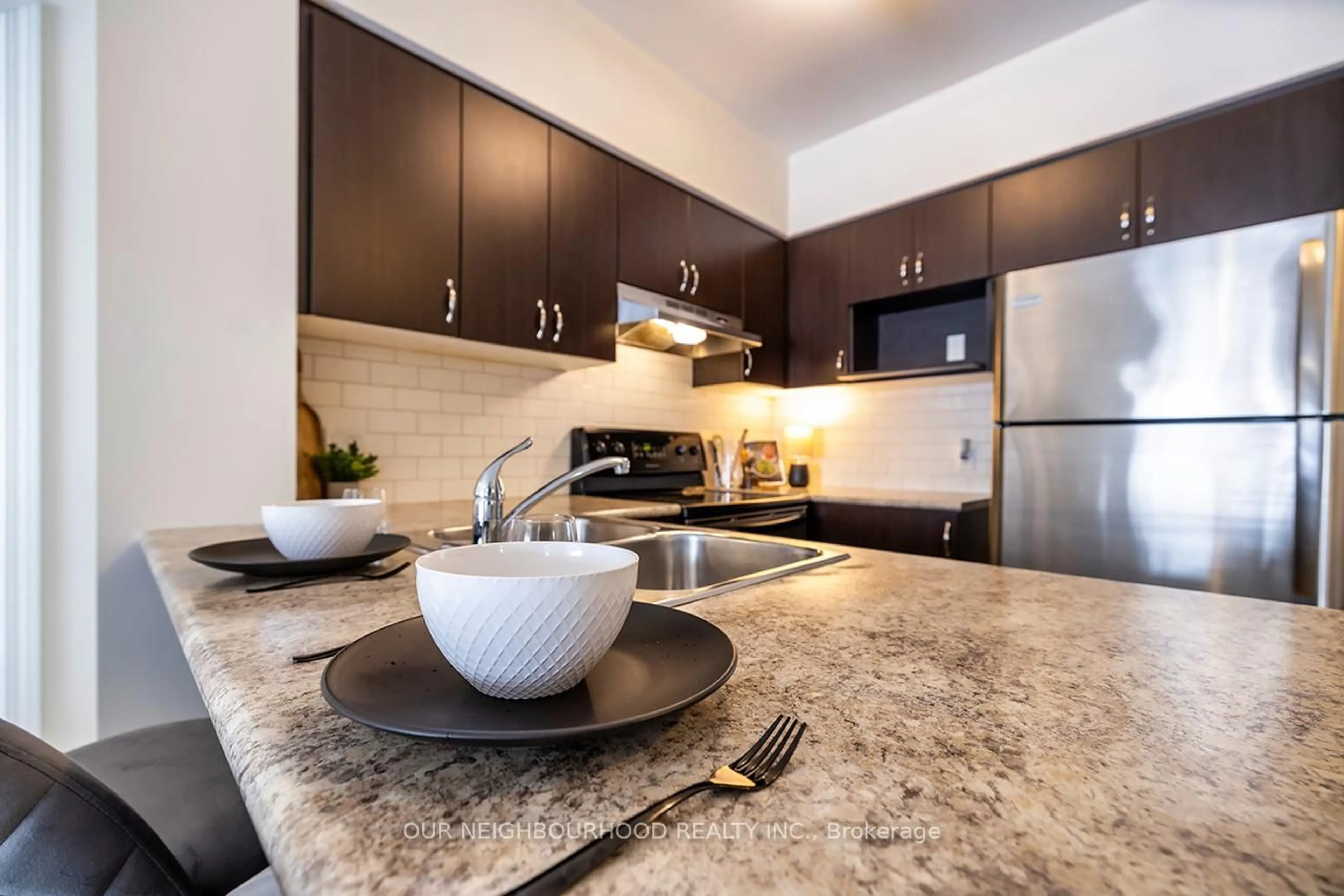 Open concept kitchen, ceramic/tile floor for 930 Wentworth St #102, Peterborough West Ontario K9J 8R8