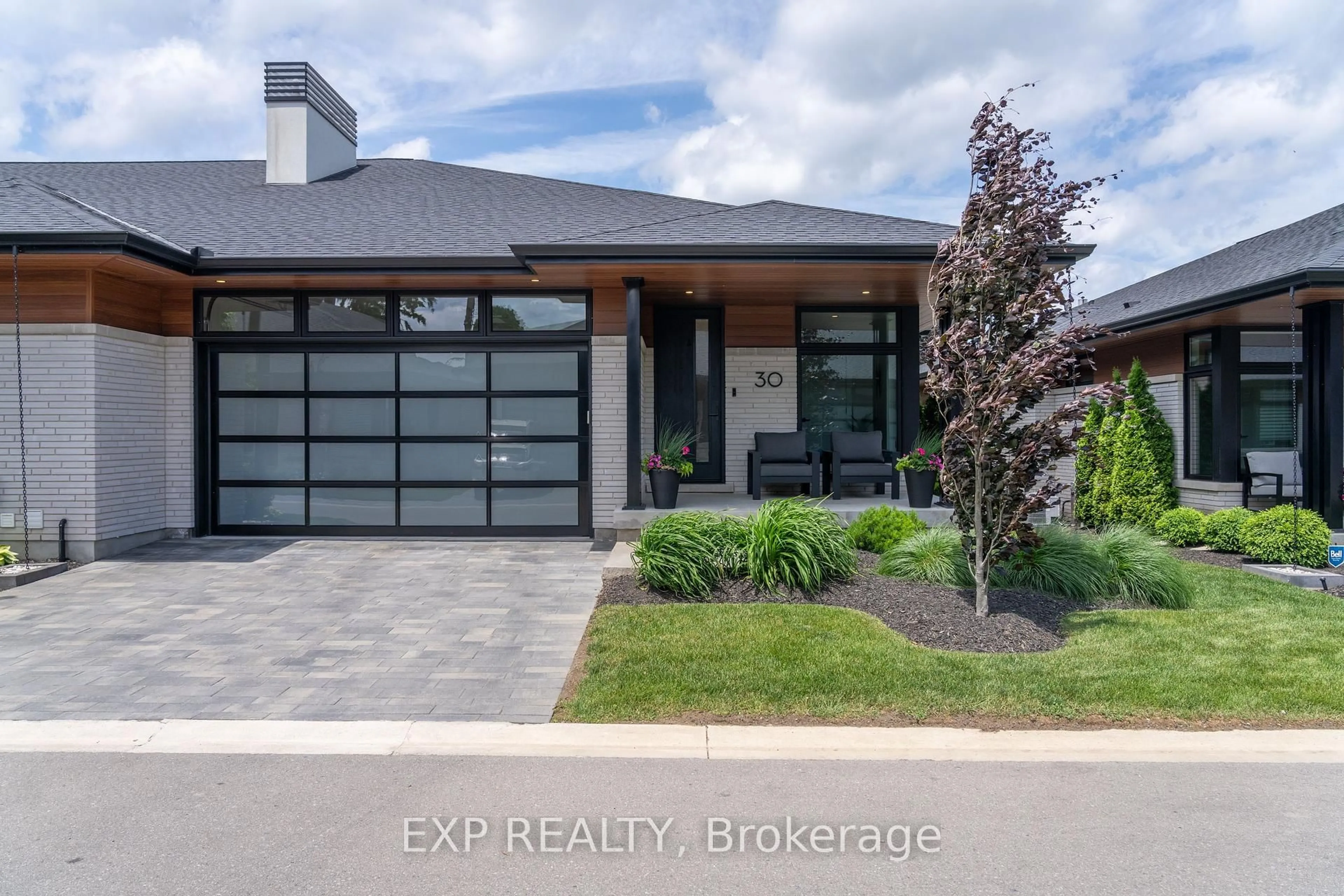Home with brick exterior material, street for 30 Peach Tree Common, St. Catharines Ontario L2N 0B6