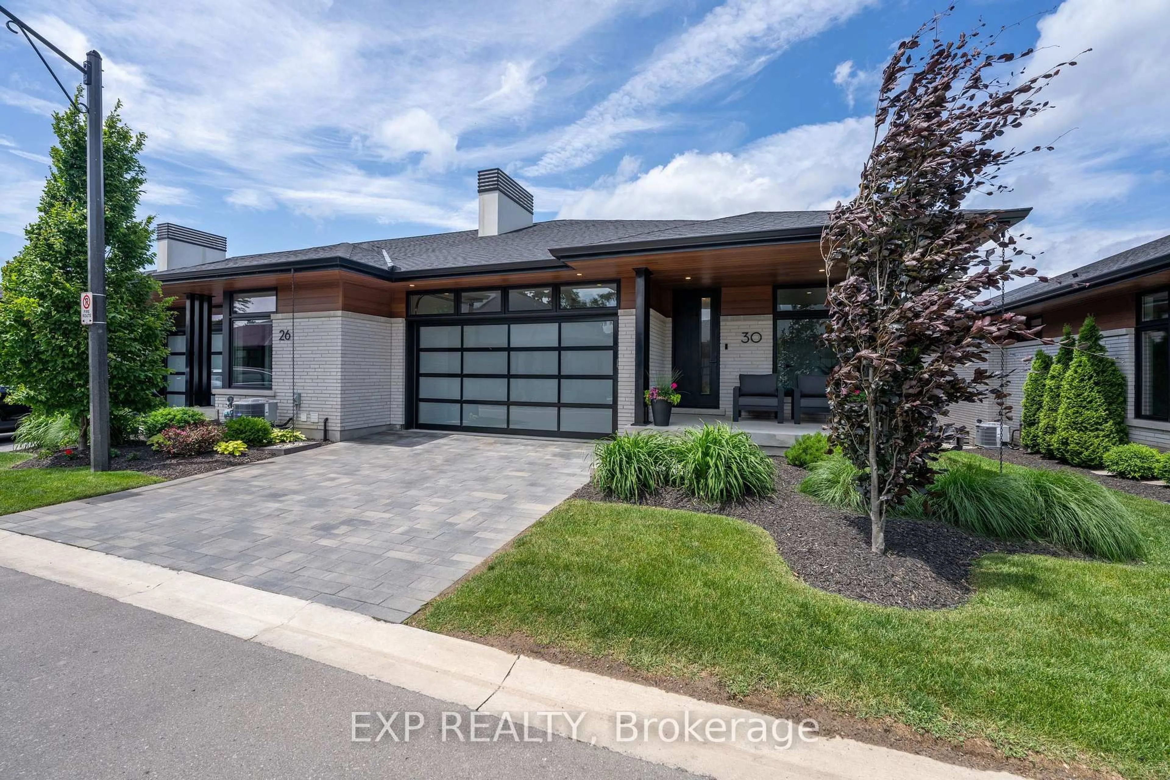 Home with brick exterior material, street for 30 Peach Tree Common, St. Catharines Ontario L2N 0B6