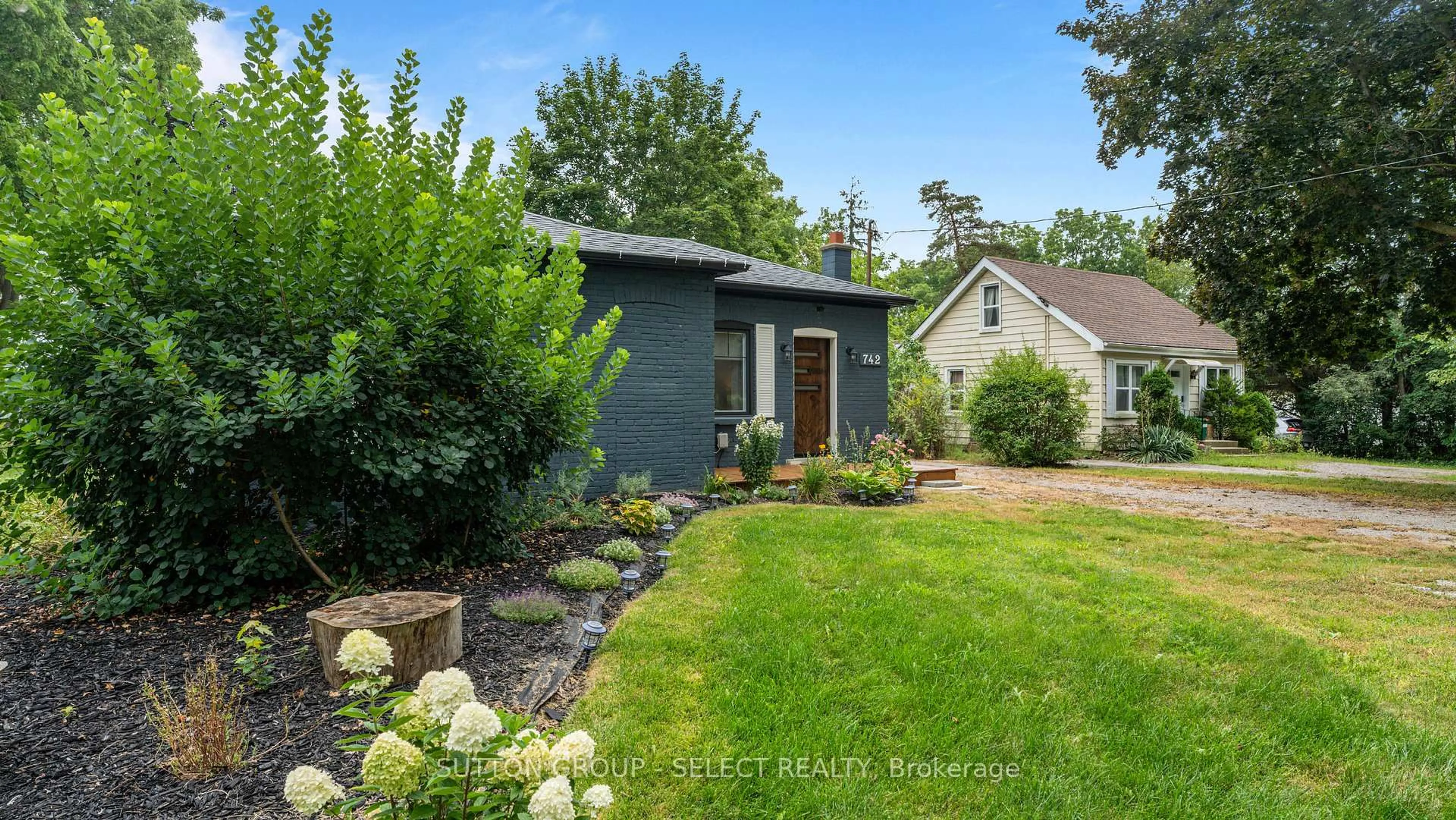 Home with brick exterior material, street for 742 Mount Pleasant Rd, Brant Ontario N3T 5L5