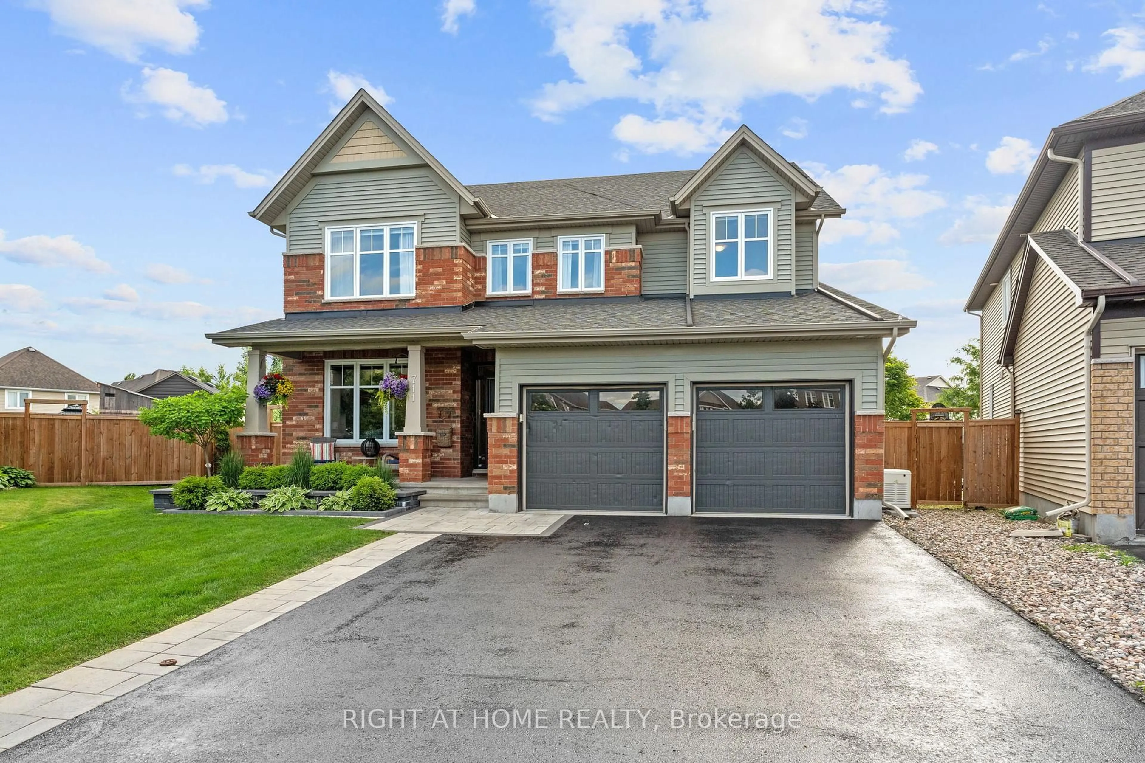 Home with brick exterior material, street for 711 Wrangler Circ, Stittsville Ontario K2S 0R2