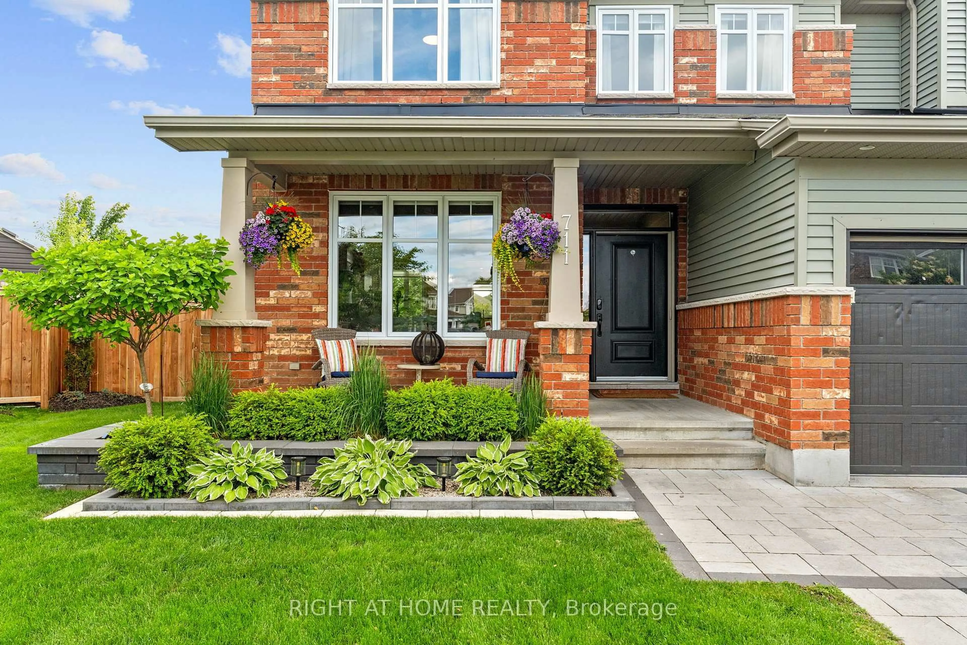 Home with brick exterior material, street for 711 Wrangler Circ, Stittsville Ontario K2S 0R2