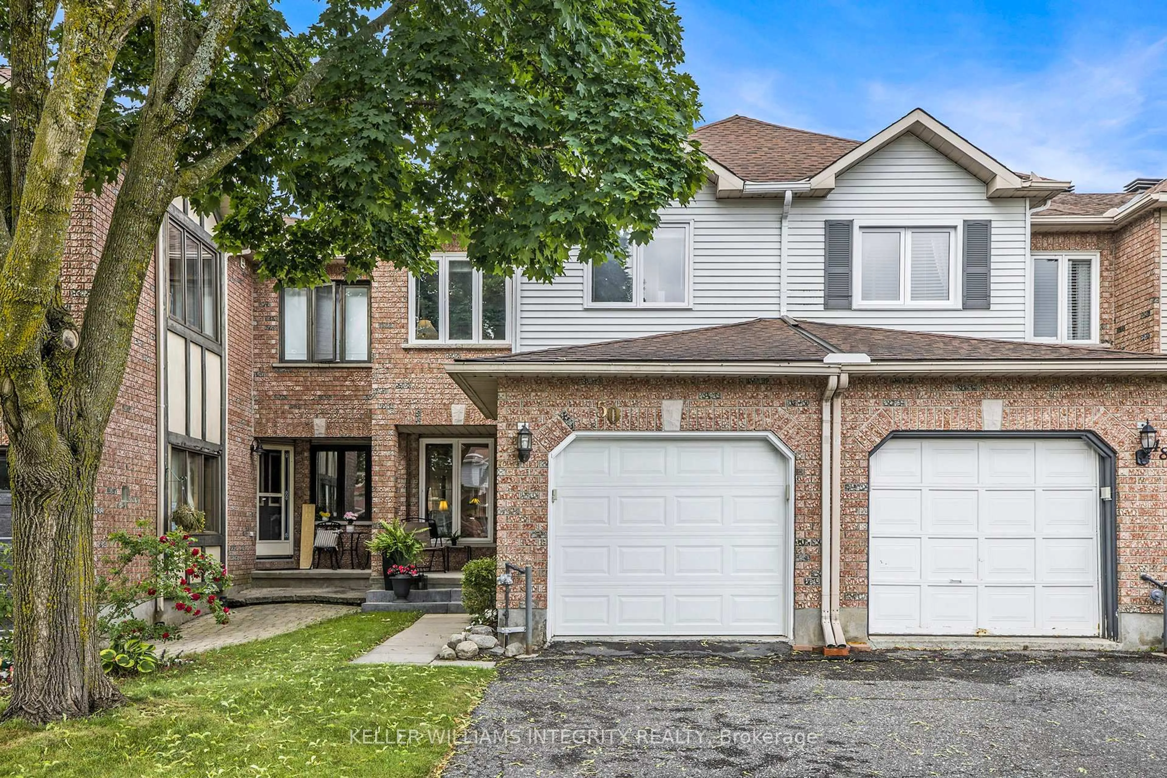 Home with brick exterior material, street for 50 Grenadier Way, Ottawa Ontario K2J 4L4