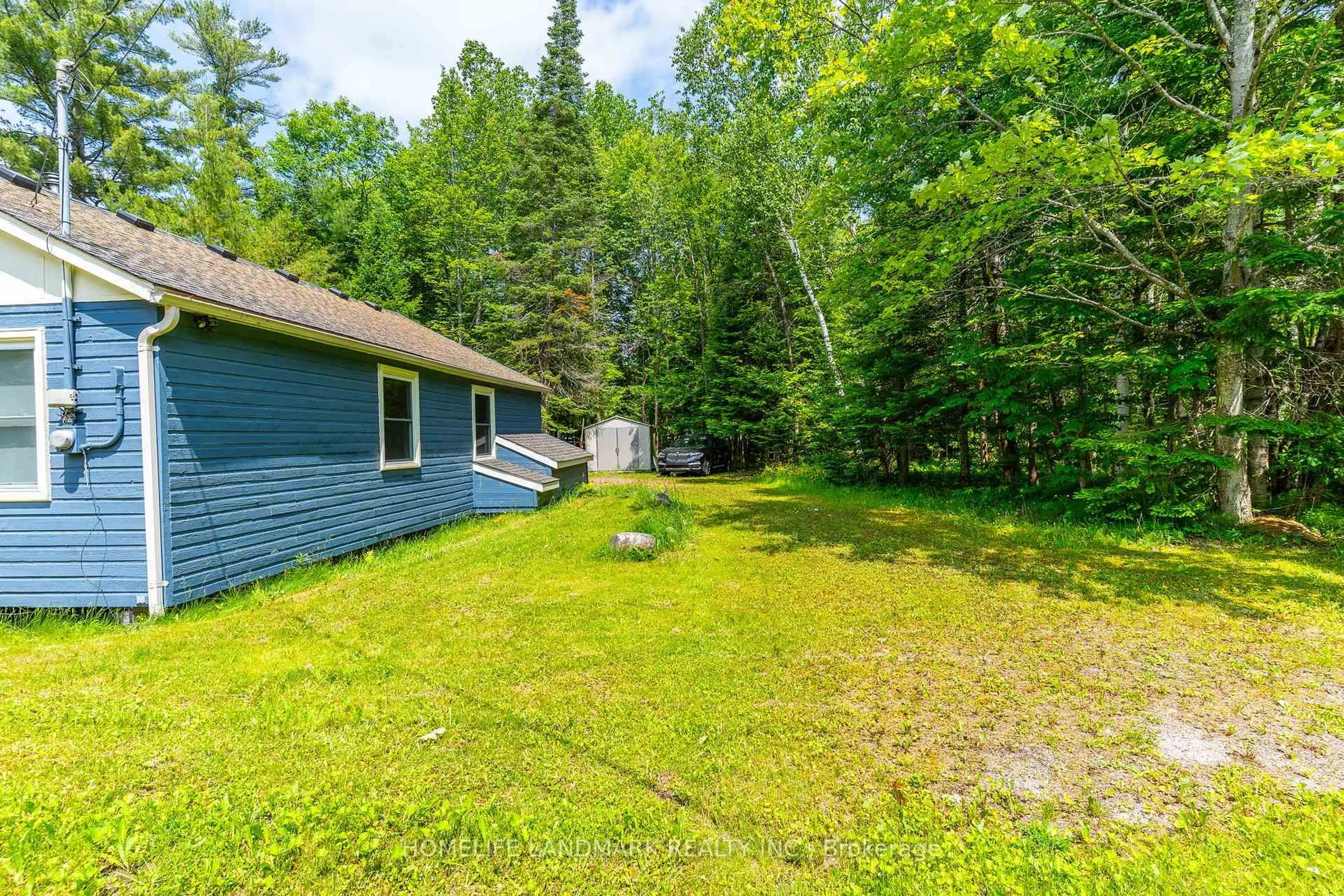 Patio, forest/trees view for 1068 Pleasant Point Rd, Minden Hills Ontario K0M 2K0
