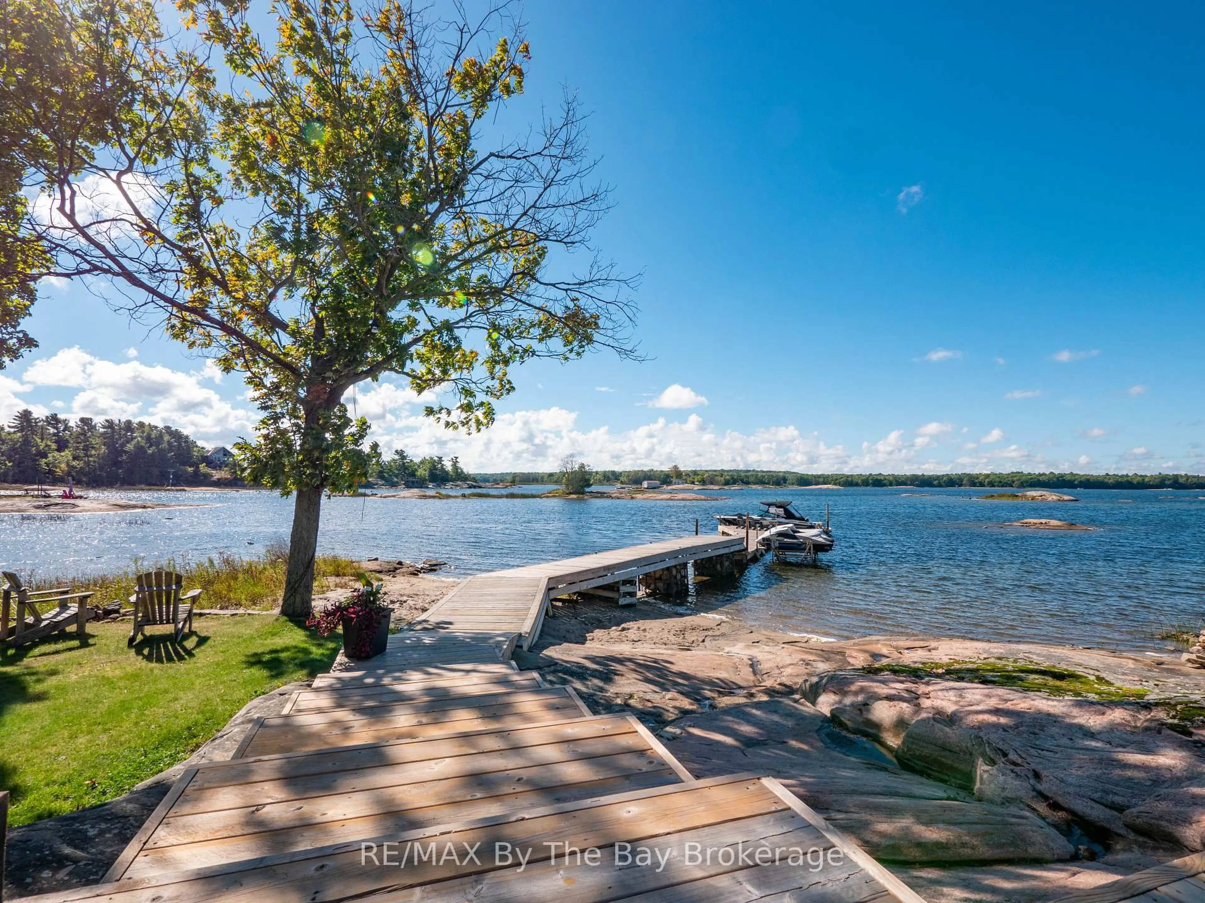 A pic from outside/outdoor area/front of a property/back of a property/a pic from drone, water/lake/river/ocean view for 4476 Island 1040/Little Beausoleil Island, Georgian Bay Ontario P0E 1E0