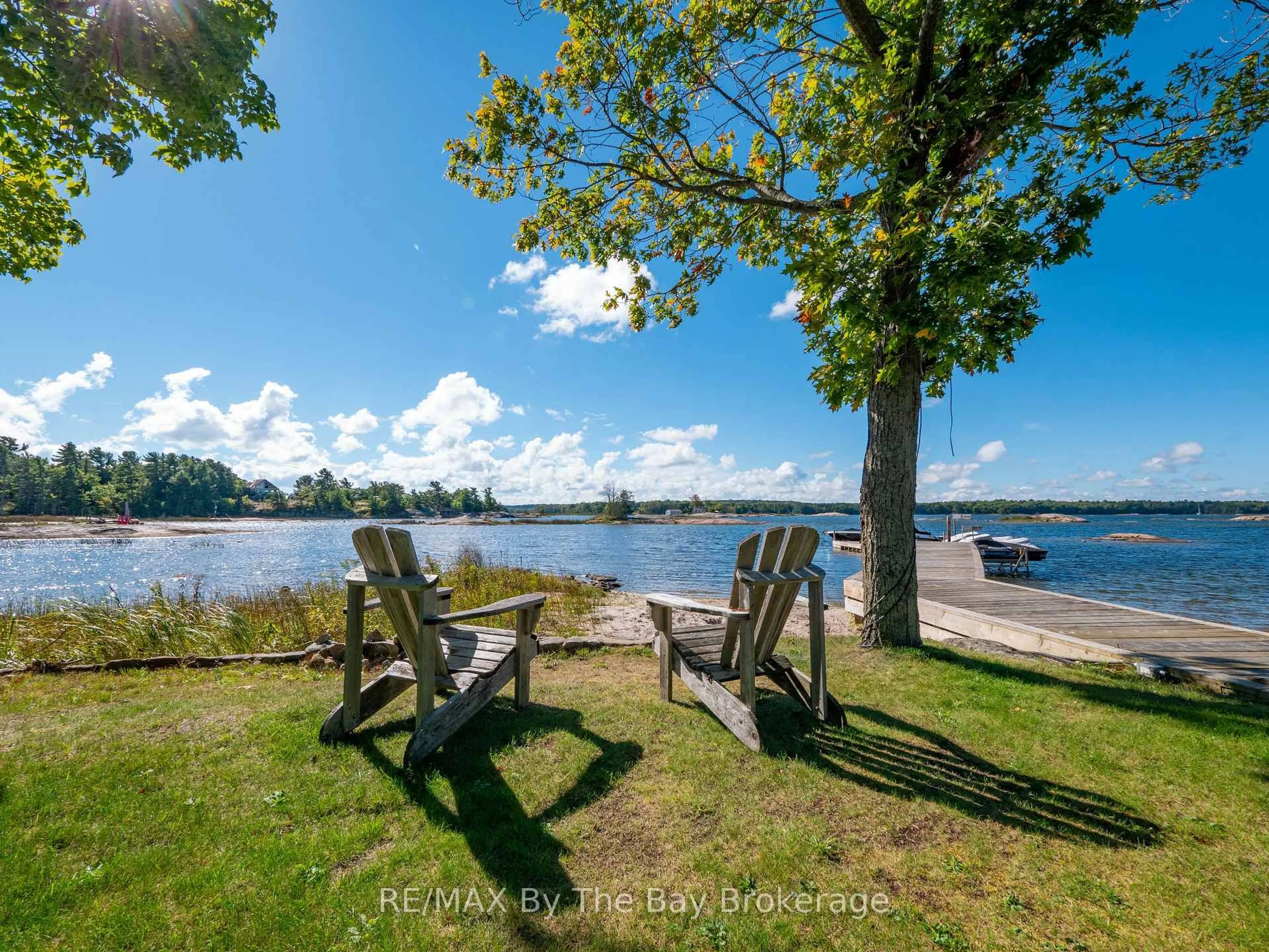 A pic from outside/outdoor area/front of a property/back of a property/a pic from drone, water/lake/river/ocean view for 4476 Island 1040/Little Beausoleil Island, Georgian Bay Ontario P0E 1E0