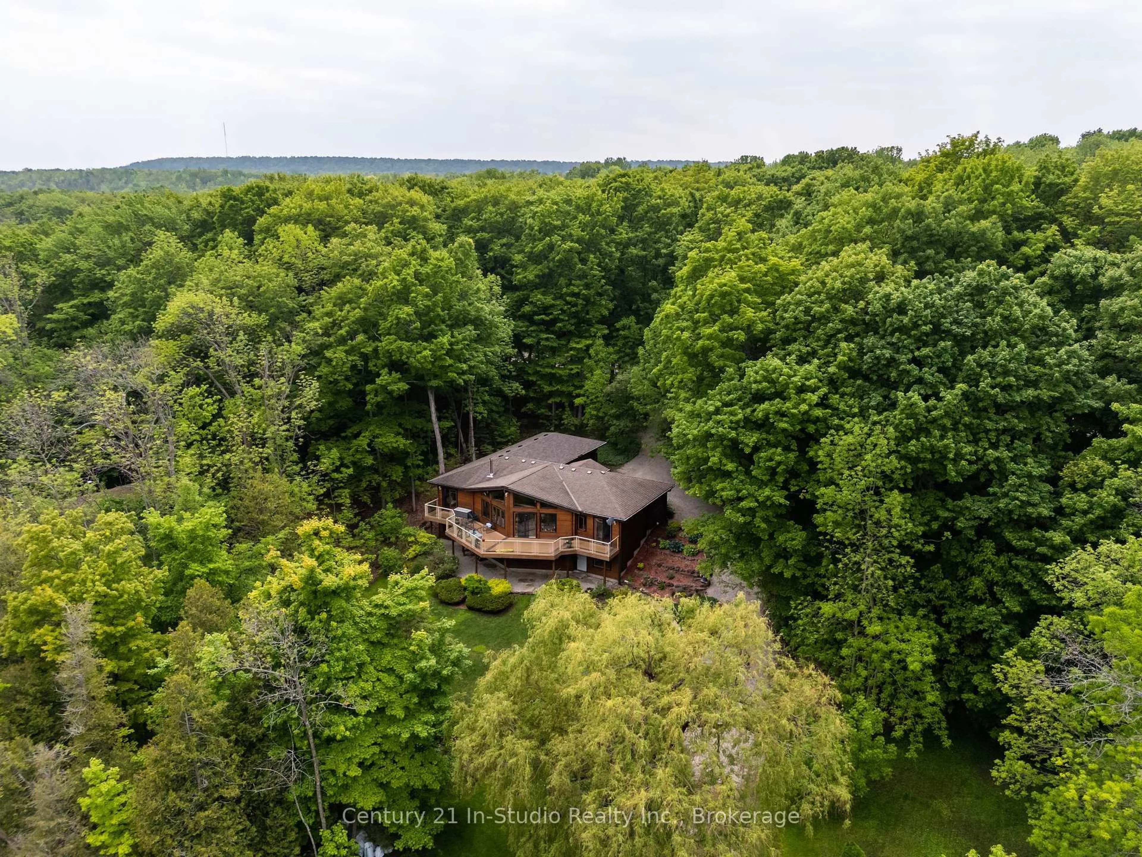 A pic from outside/outdoor area/front of a property/back of a property/a pic from drone, forest/trees view for 504877 GREY 1 Rd, Georgian Bluffs Ontario N0H 1S0