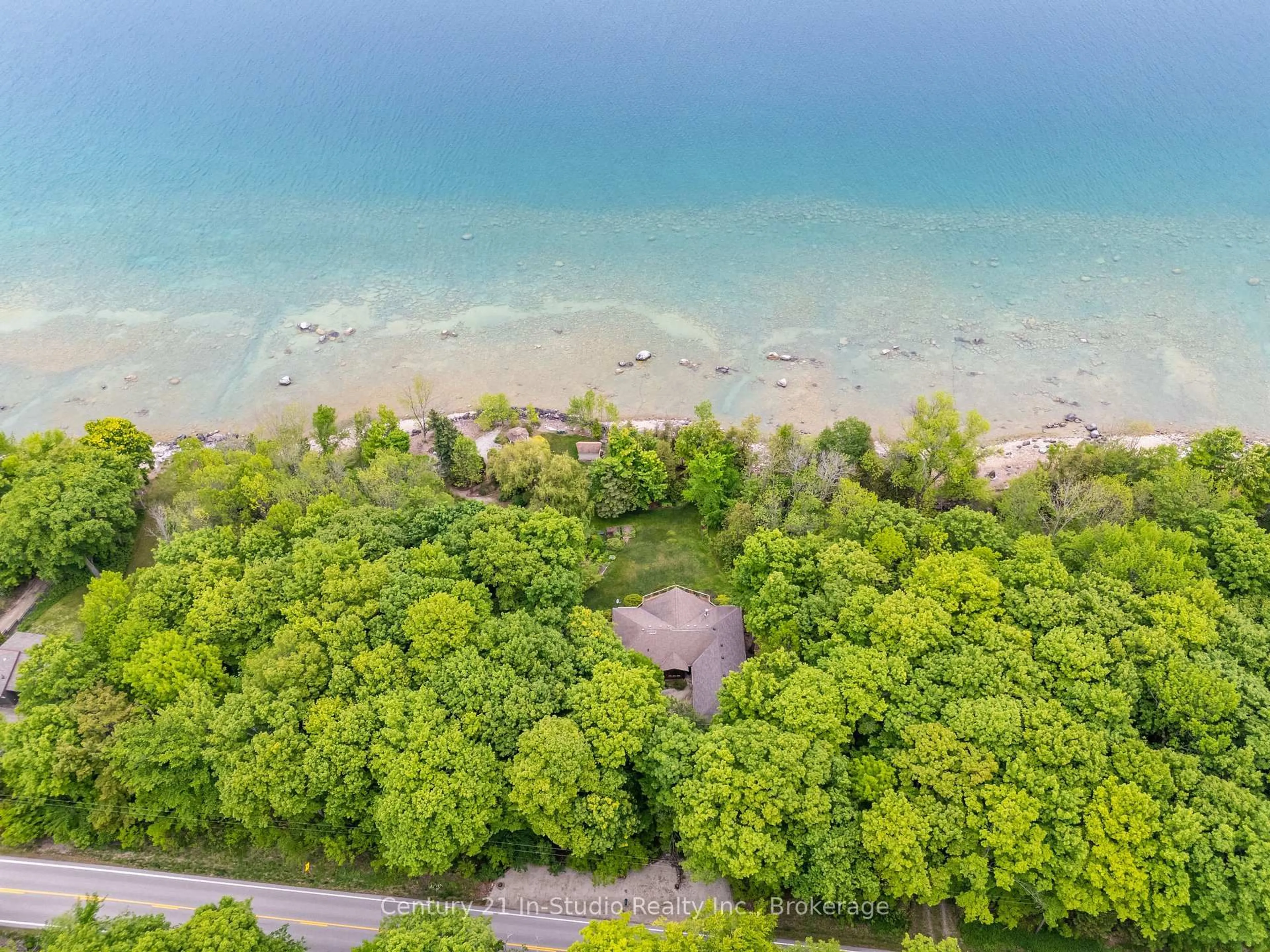 A pic from outside/outdoor area/front of a property/back of a property/a pic from drone, water/lake/river/ocean view for 504877 GREY 1 Rd, Georgian Bluffs Ontario N0H 1S0