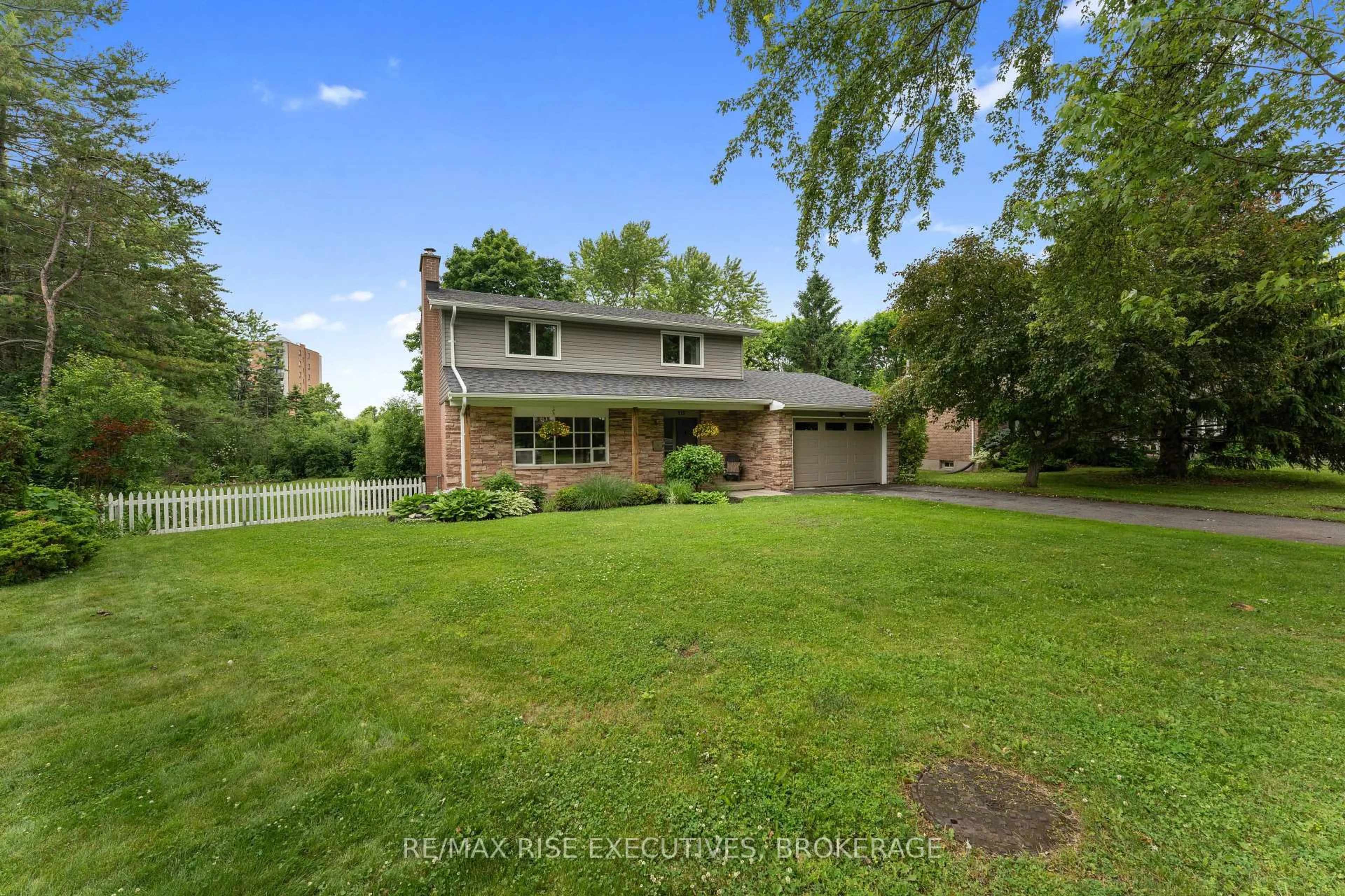A pic from outside/outdoor area/front of a property/back of a property/a pic from drone, water/lake/river/ocean view for 115 Fairway Hill Cres, Kingston Ontario K7M 2B5