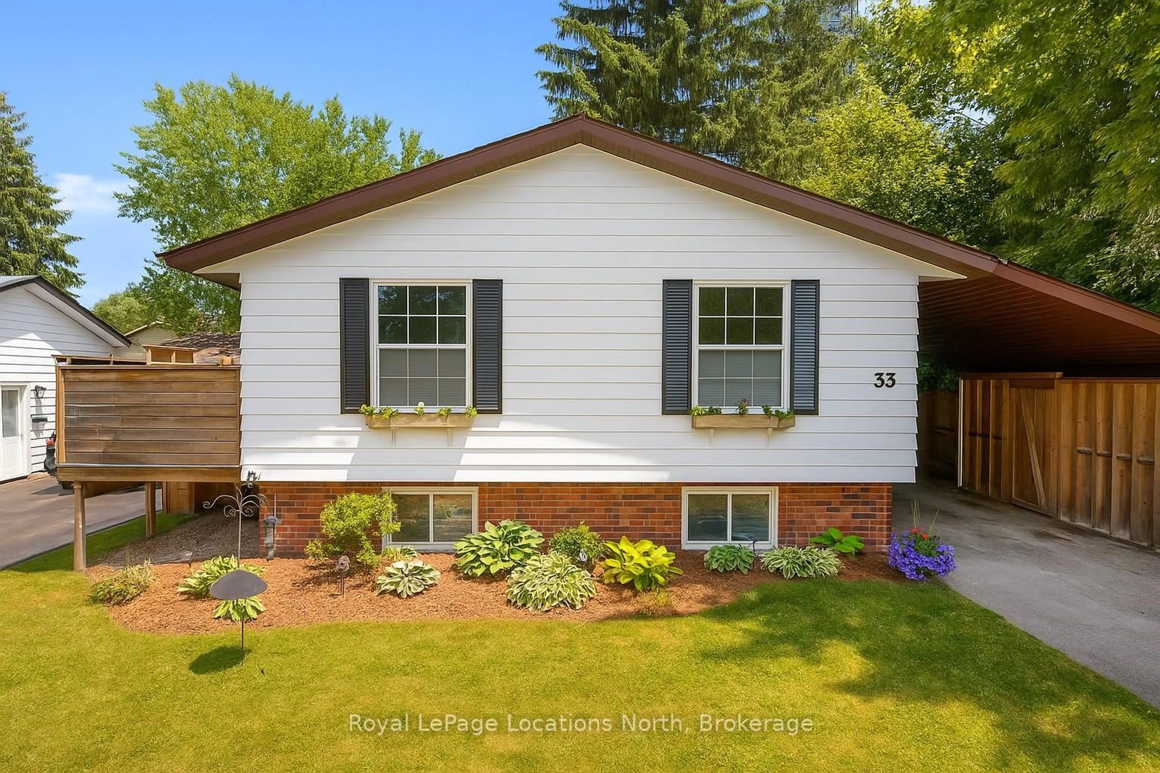 Home with vinyl exterior material, street for 33 Blake St, Meaford Ontario N4L 1E9
