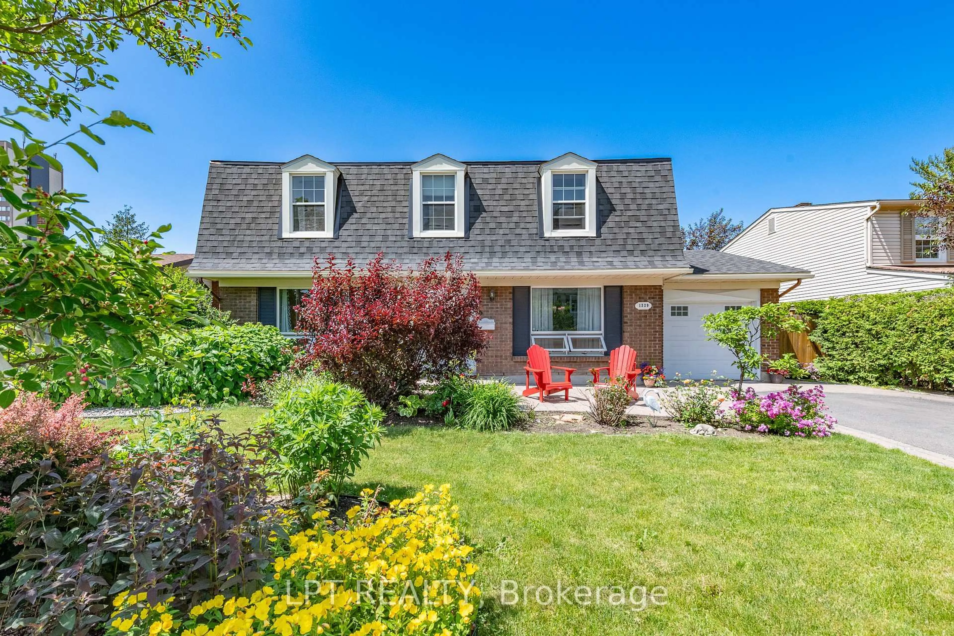 Home with vinyl exterior material, street for 1329 Fontenay Cres, Ottawa Ontario K1V 7K5