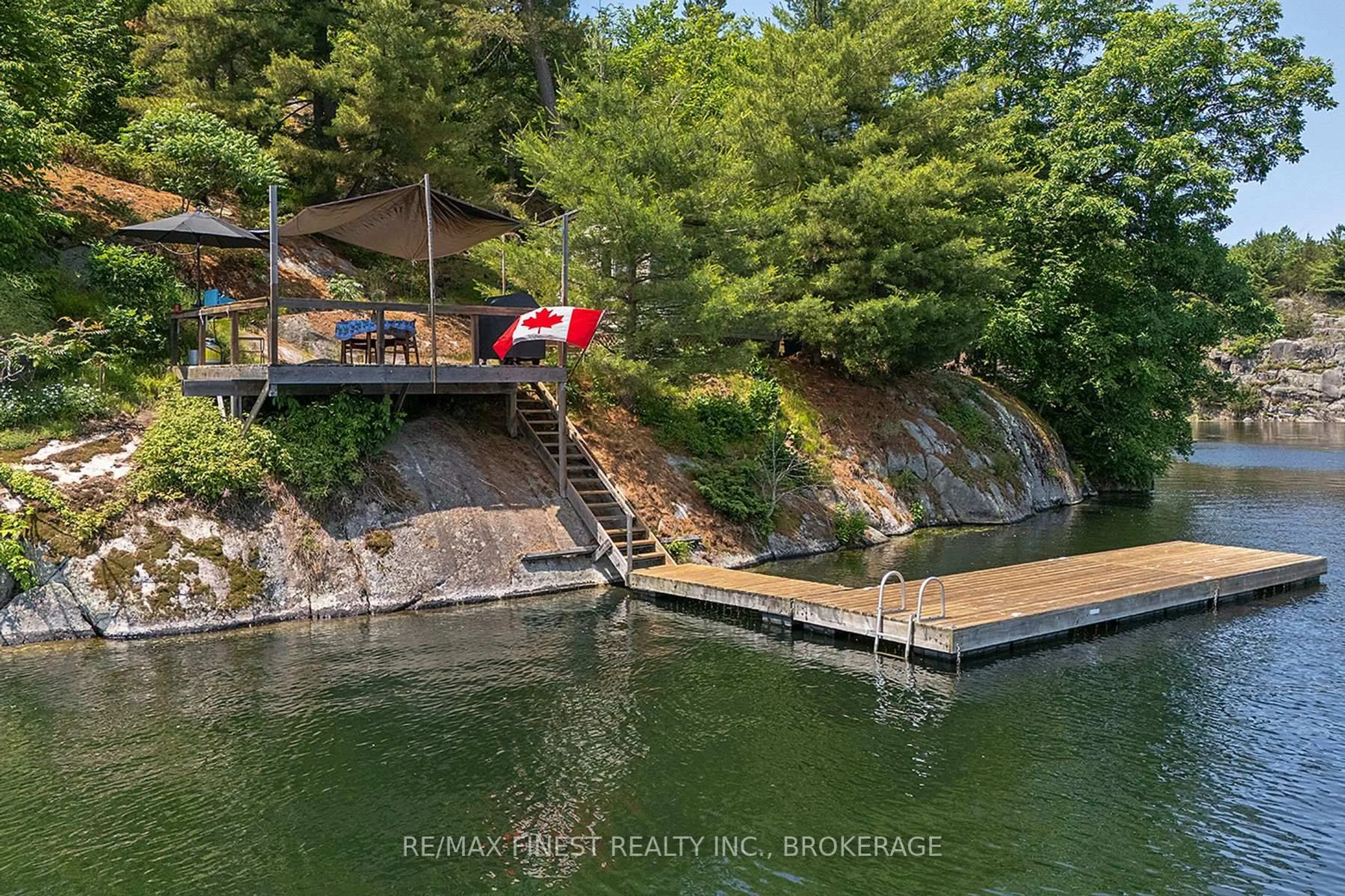 A pic from outside/outdoor area/front of a property/back of a property/a pic from drone, water/lake/river/ocean view for 806 Rainbow Ridge Lane, Leeds and the Thousand Islands Ontario K0H 2N0