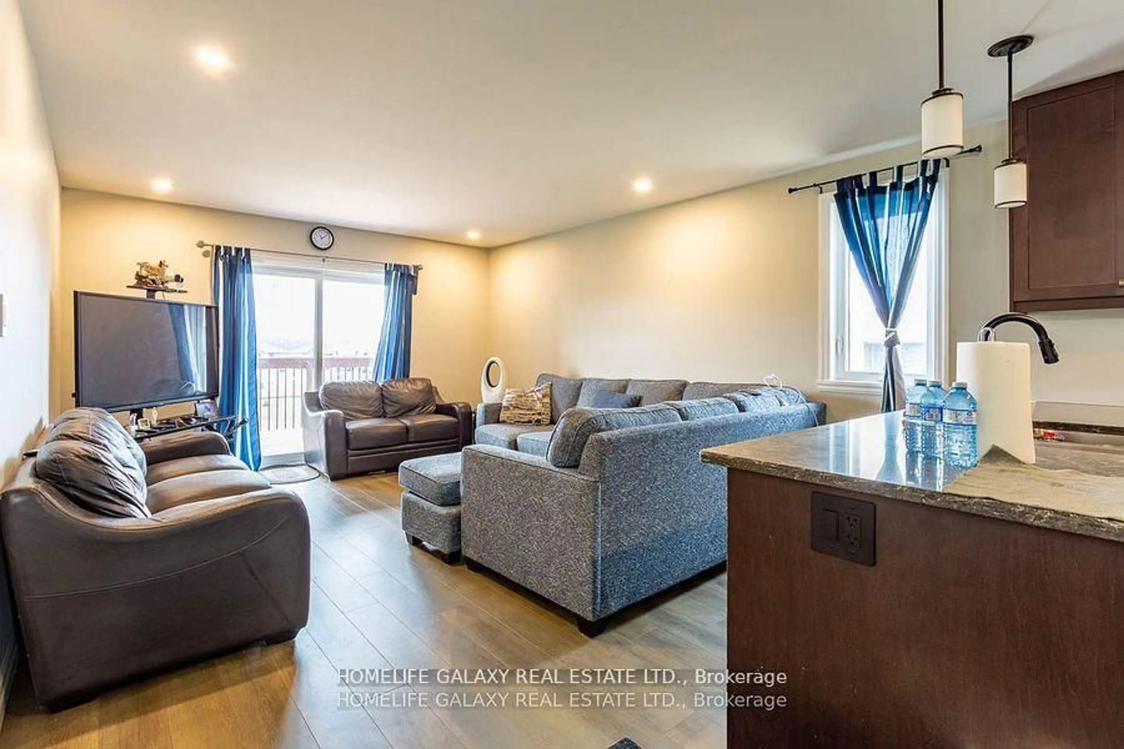 Living room with furniture, wood/laminate floor for 43 Cedar Park Cres, Quinte West Ontario K8V 0J1