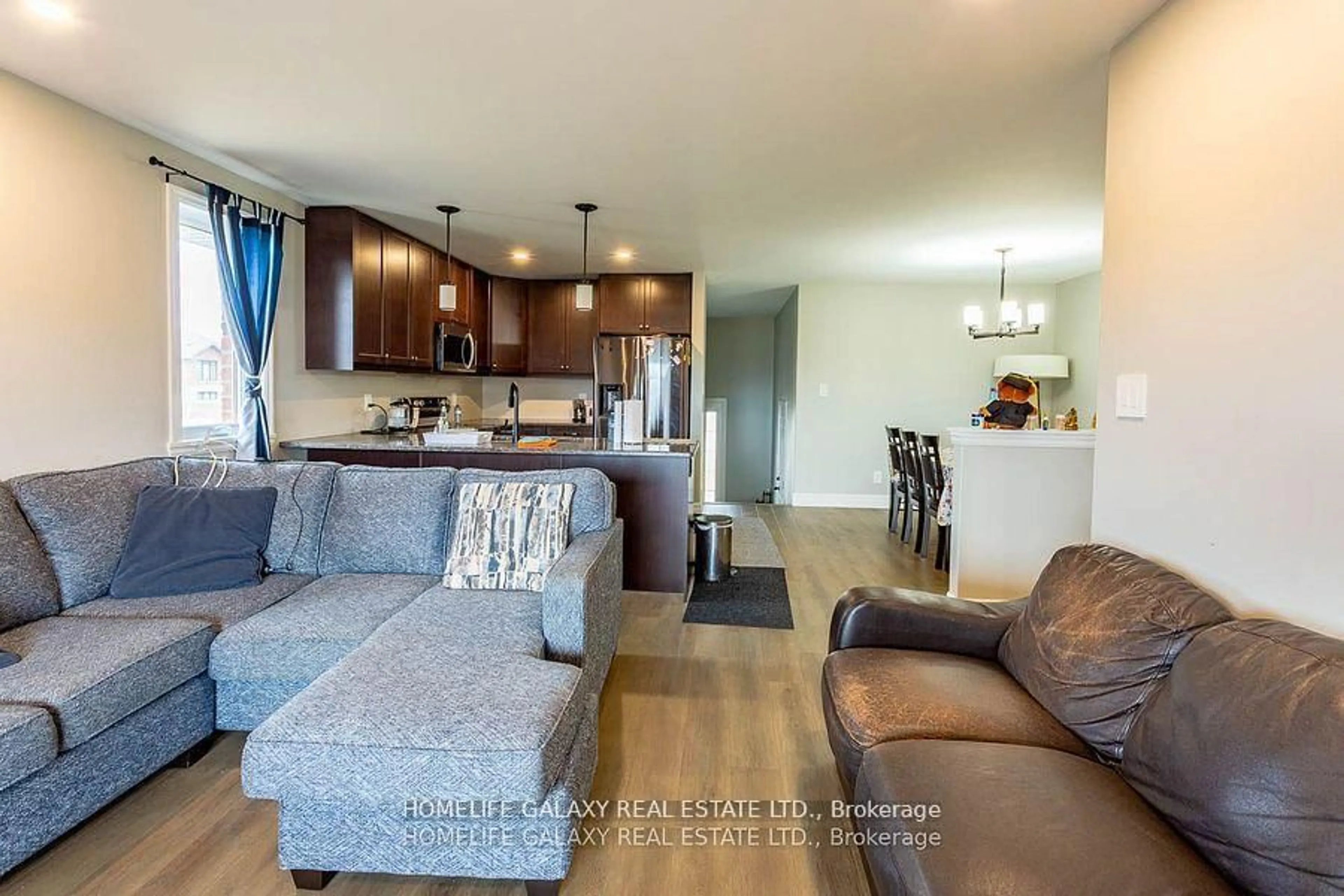 Living room with furniture, wood/laminate floor for 43 Cedar Park Cres, Quinte West Ontario K8V 0J1