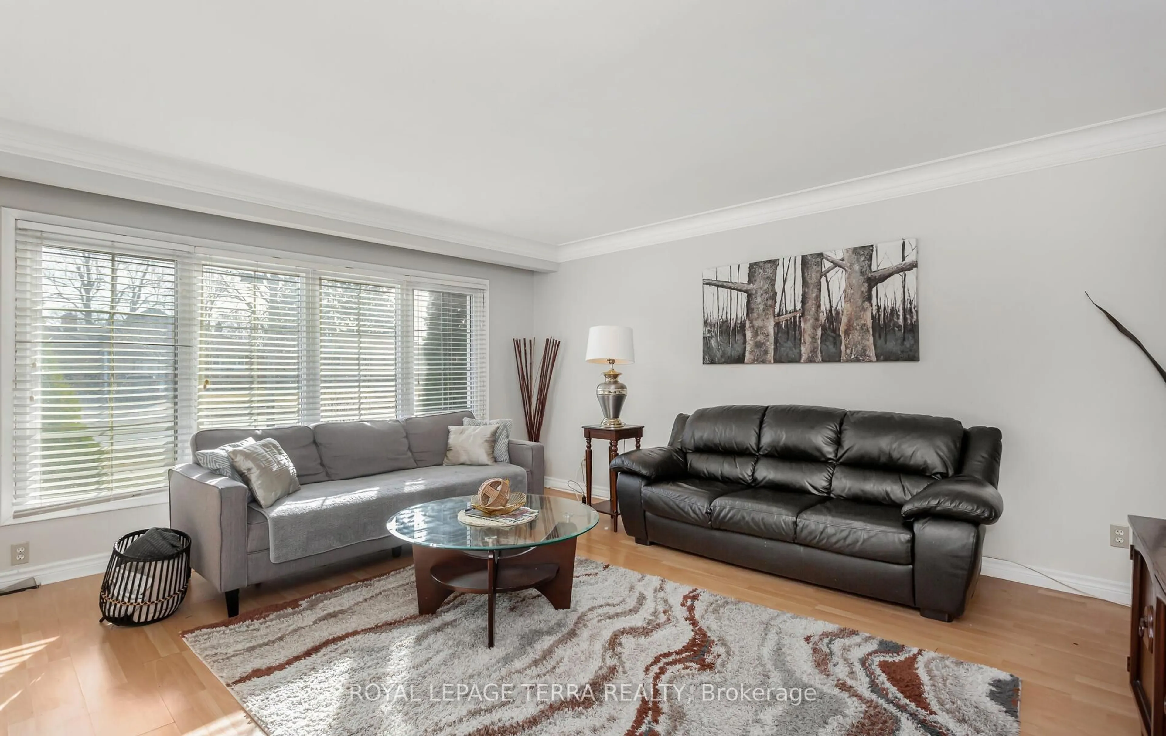 Living room with furniture, wood/laminate floor for 6267 MONTROSE Rd, Niagara Falls Ontario L2H 1L7
