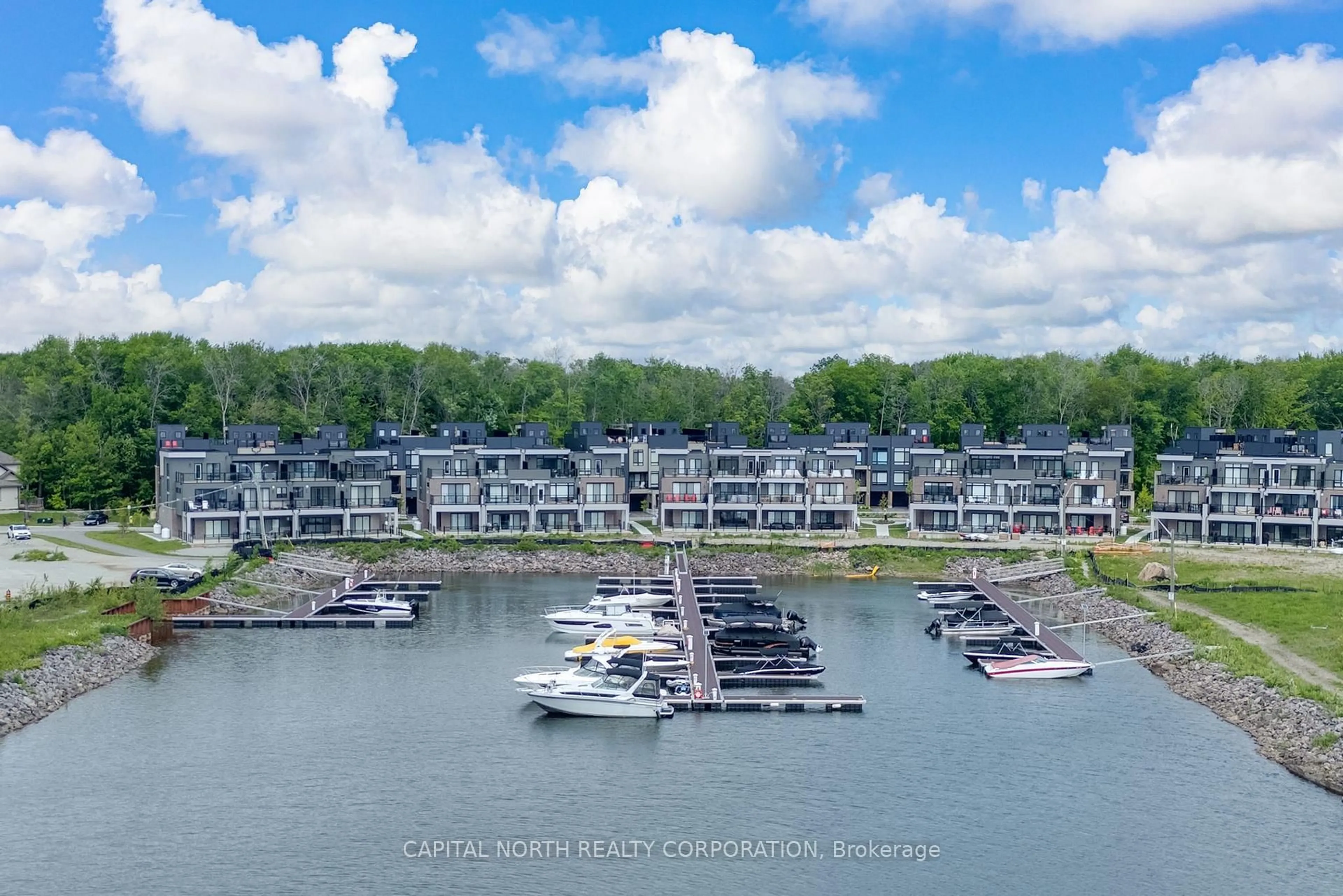 A pic from outside/outdoor area/front of a property/back of a property/a pic from drone, water/lake/river/ocean view for 74 Marina Village Dr, Georgian Bay Ontario L0K 1S0