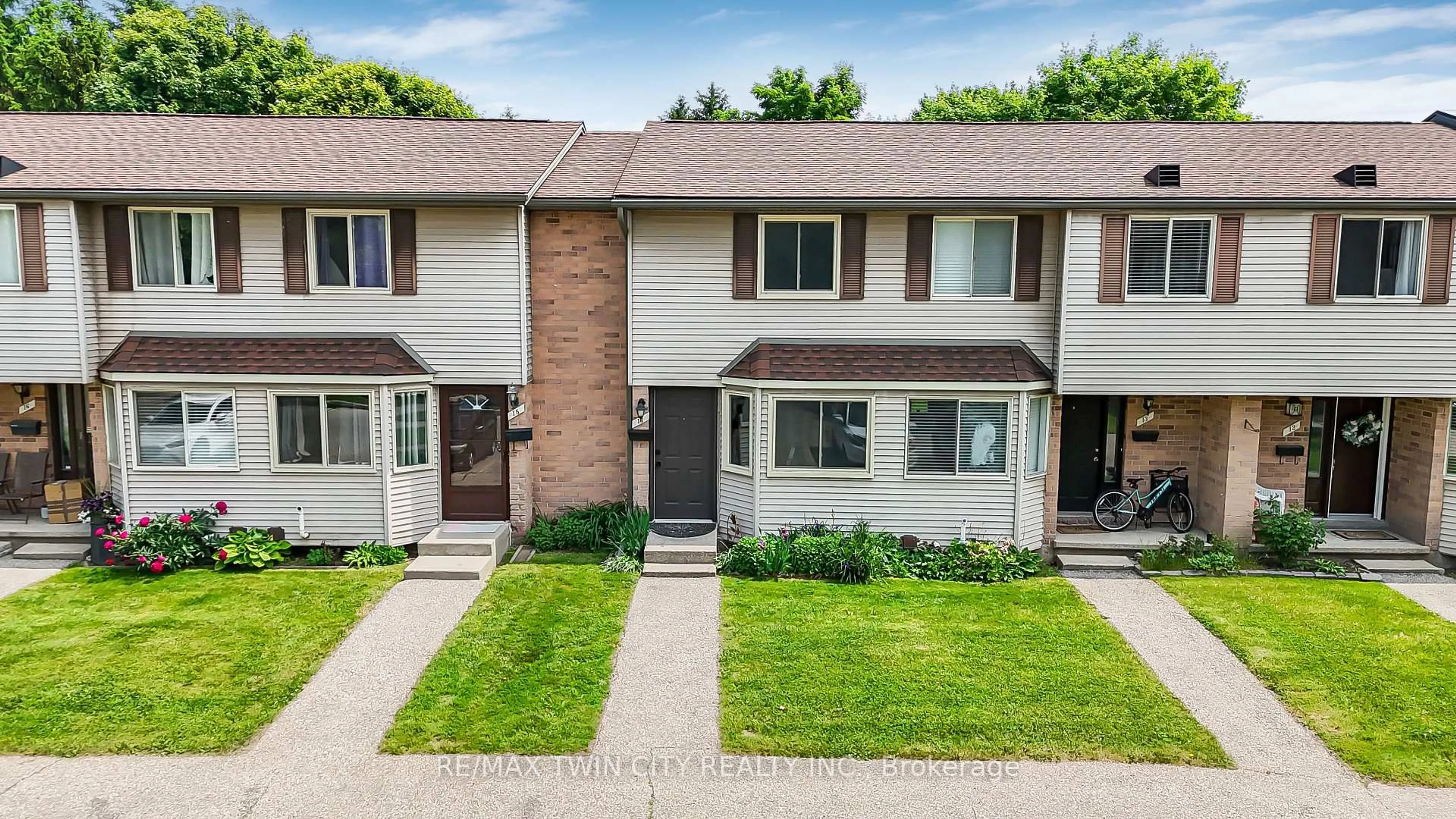 A pic from outside/outdoor area/front of a property/back of a property/a pic from drone, street for 750 Erinbrook Dr #14, Kitchener Ontario N2E 2S7