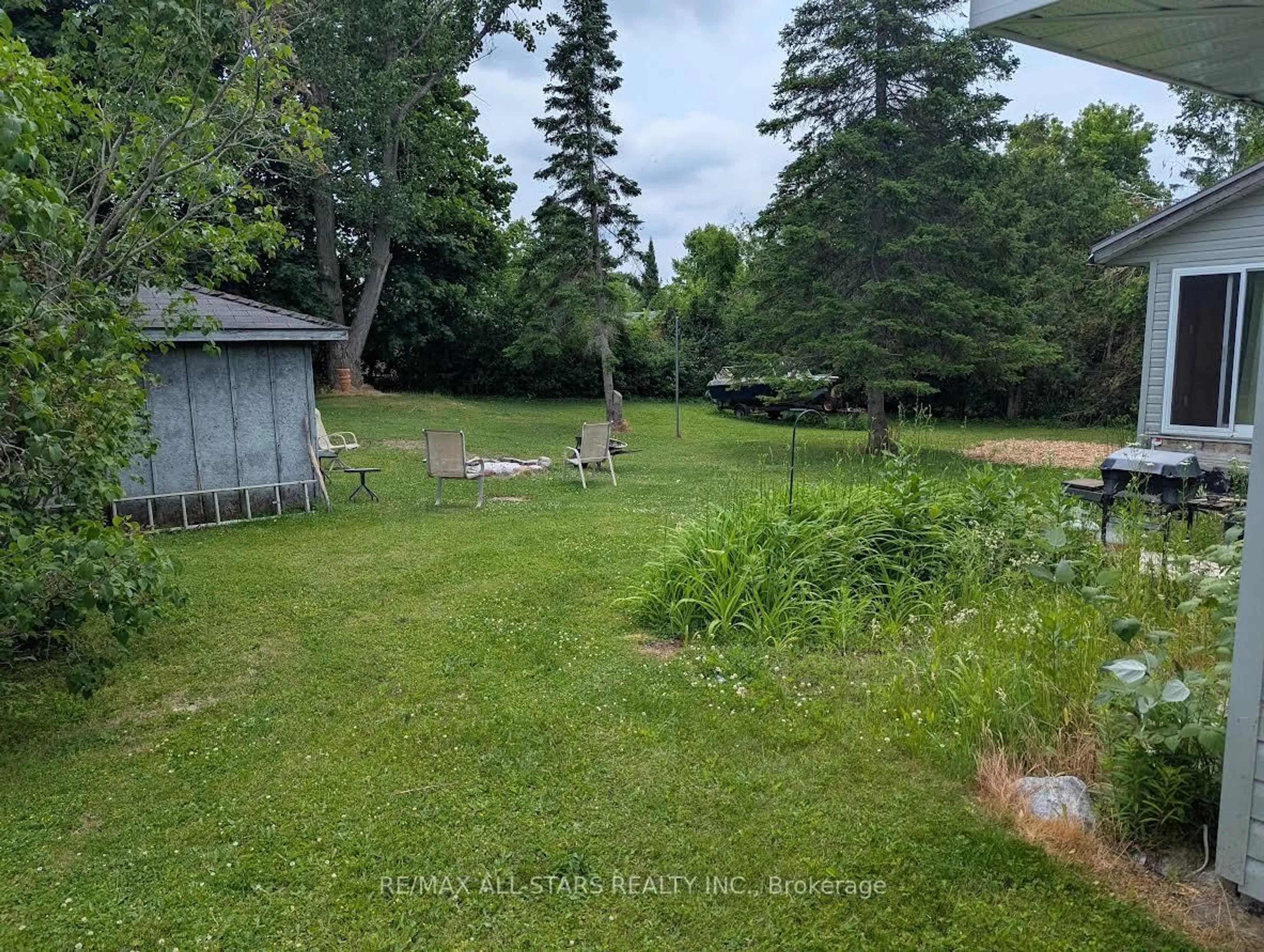 A pic from outside/outdoor area/front of a property/back of a property/a pic from drone, forest/trees view for 234 Crosby Dr, Kawartha Lakes Ontario K0M 1A0